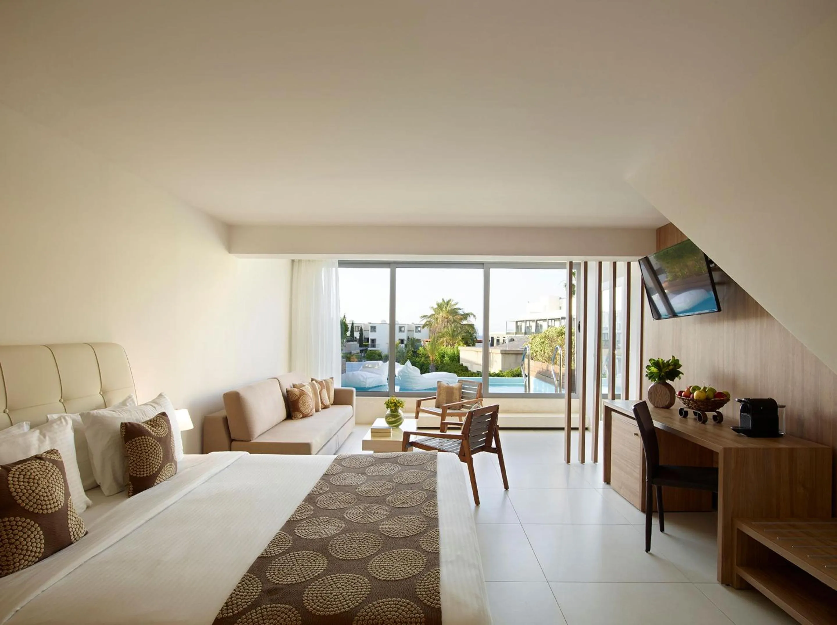 Bed in The Ixian Grand & All Suites - Adults Only Hotel