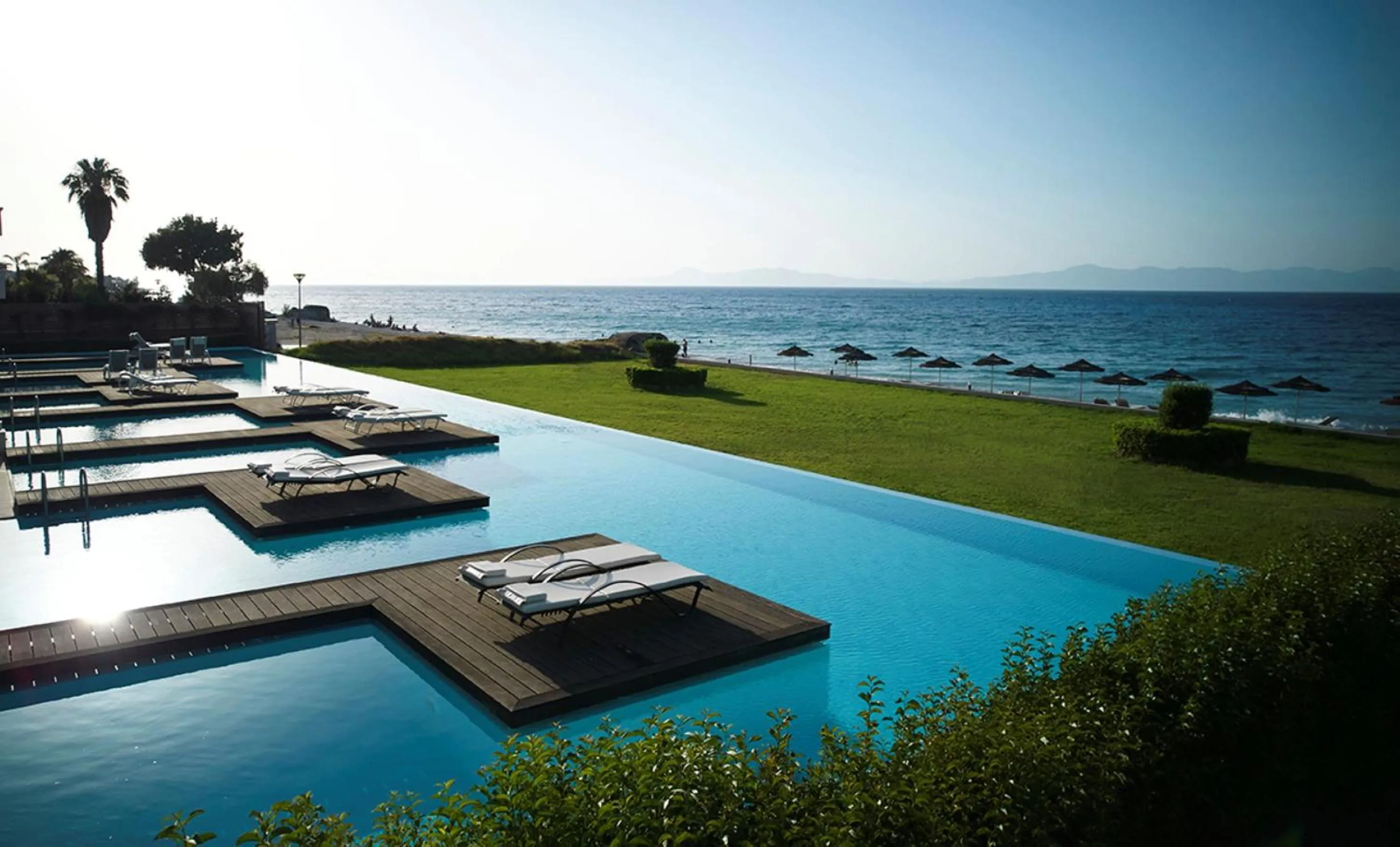 Beach in The Ixian Grand & All Suites - Adults Only Hotel