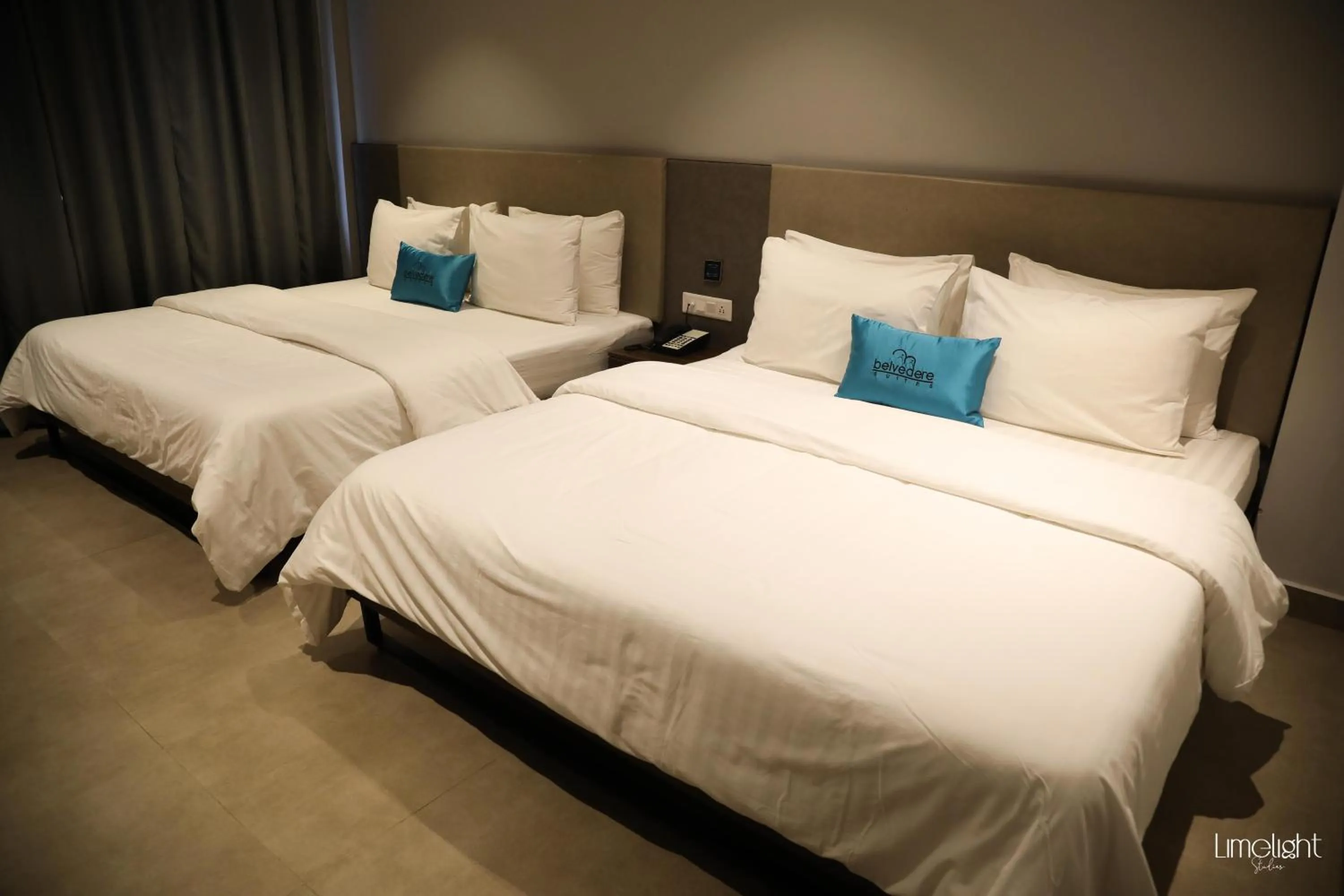 Bed in Belvedere Suites