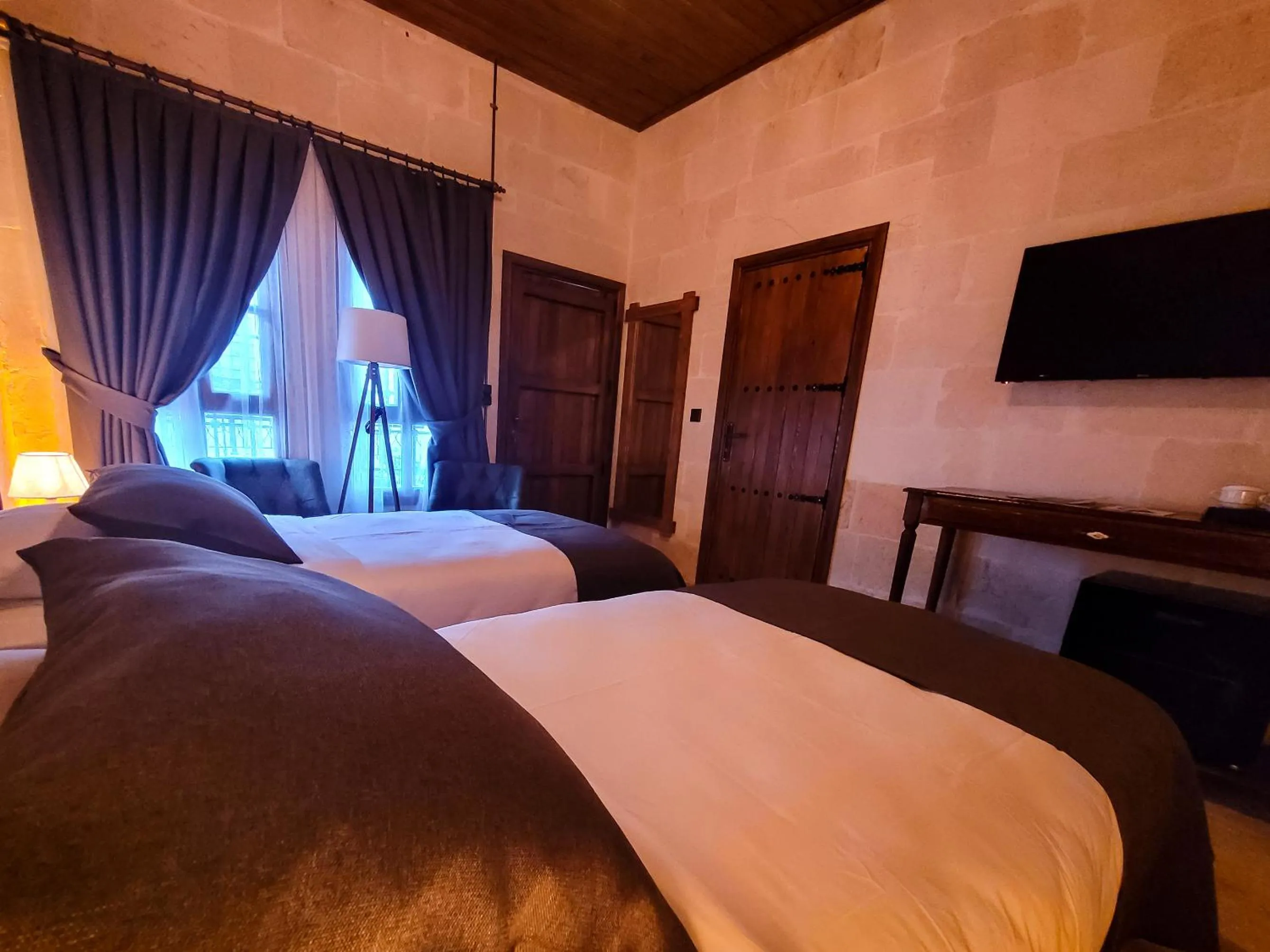 Bed in Reji Boutique Hotel
