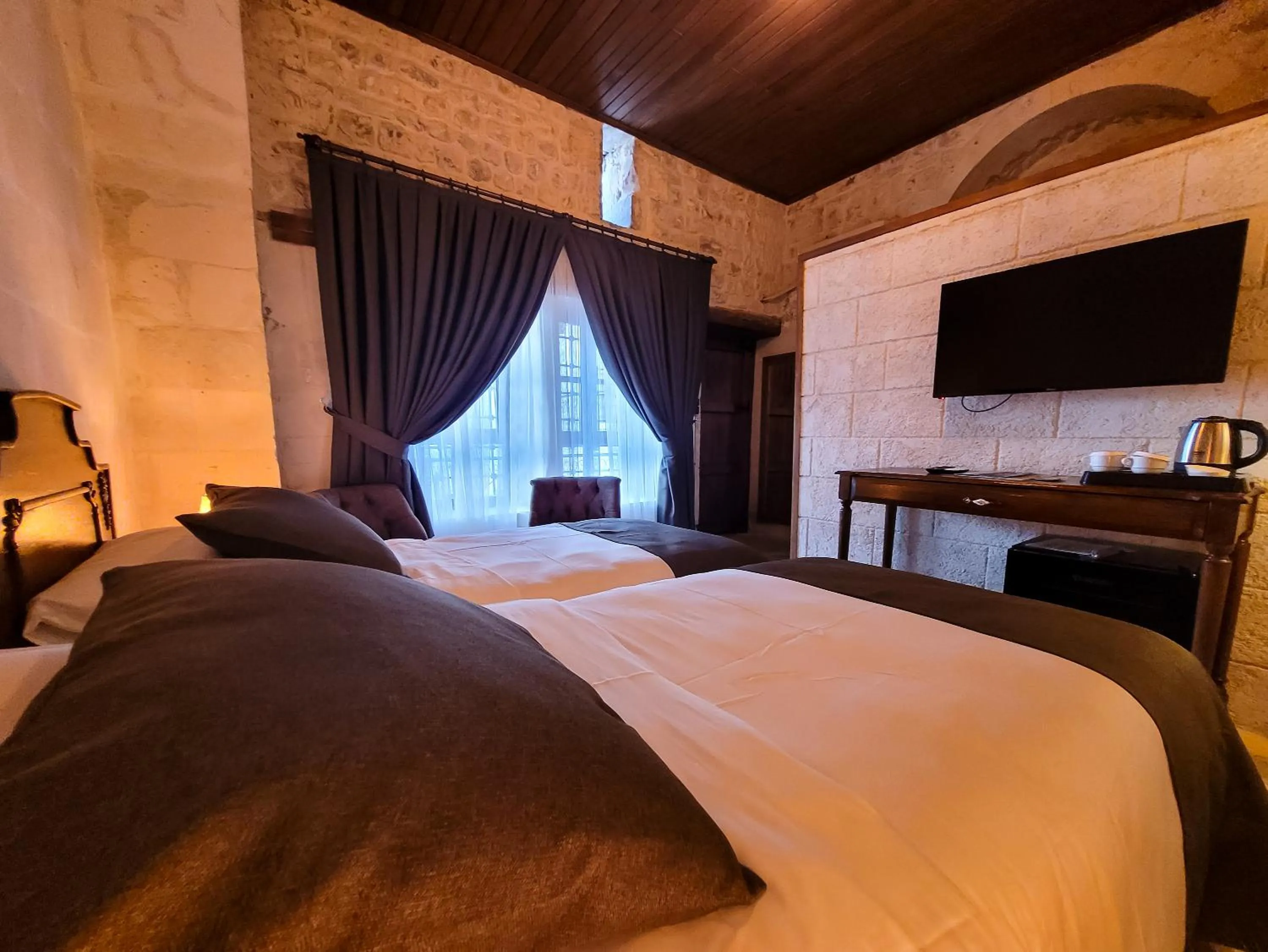 Bed in Reji Boutique Hotel