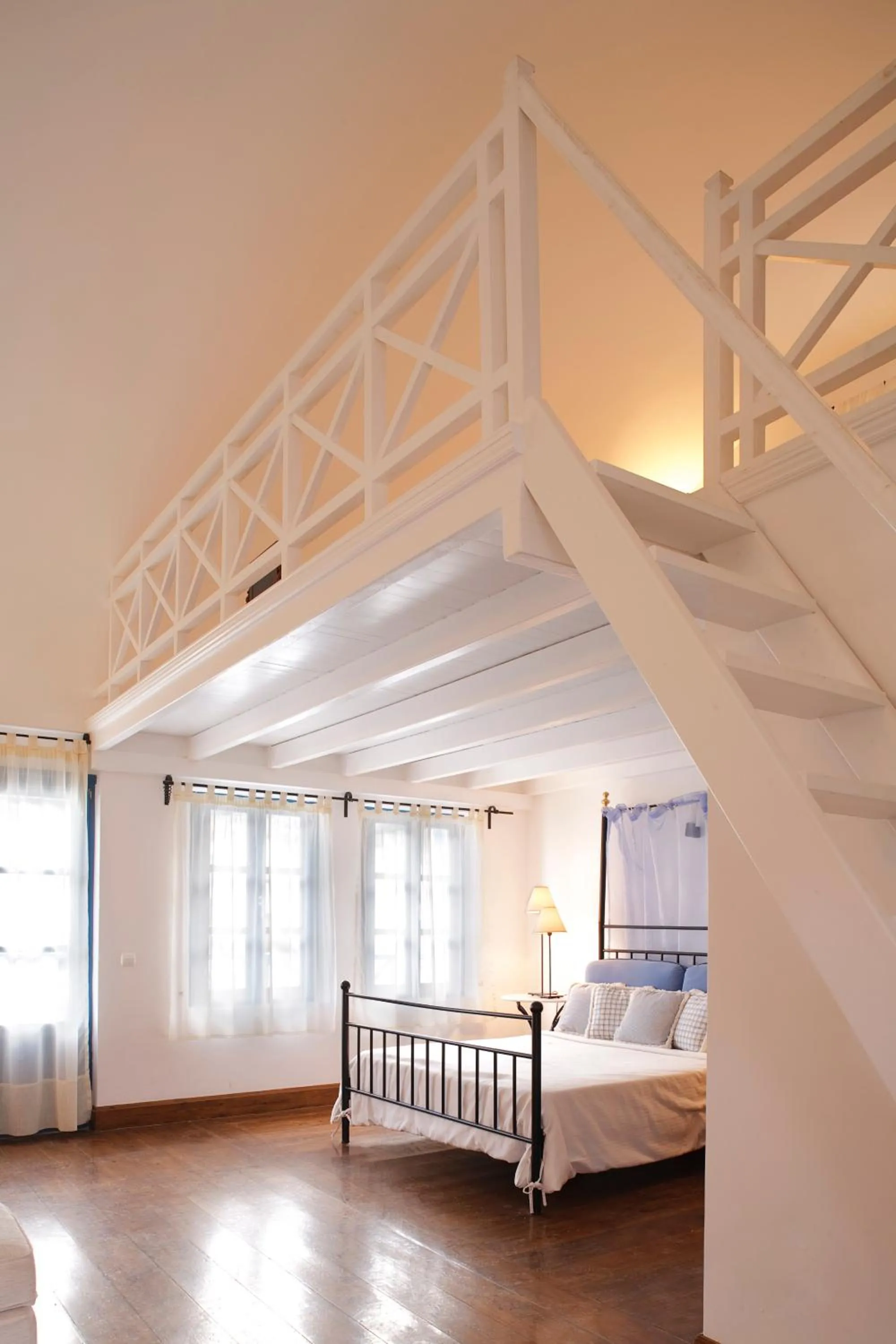 Bed in Tamarix Del Mar Suites