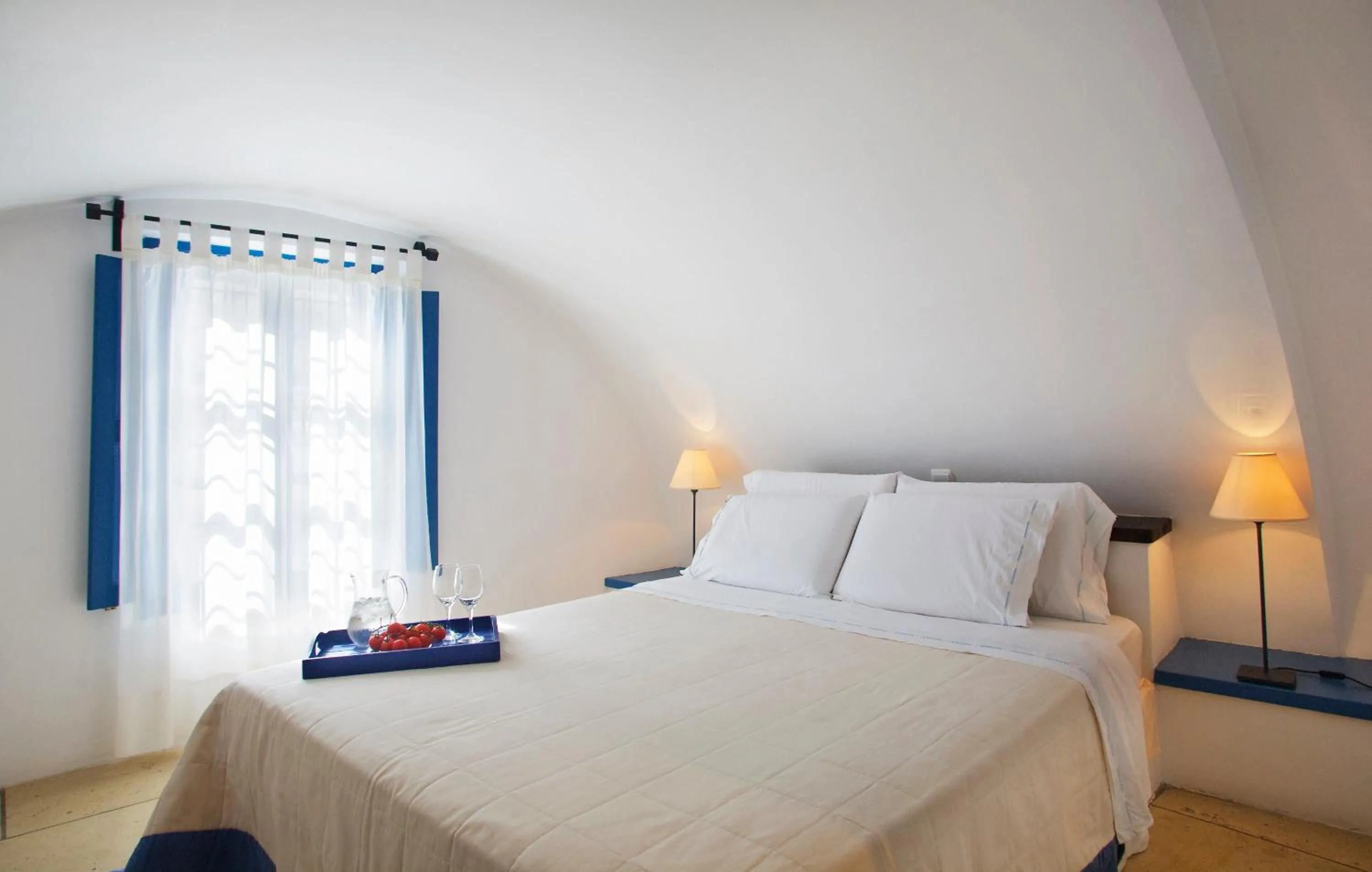 Bed in Tamarix Del Mar Suites