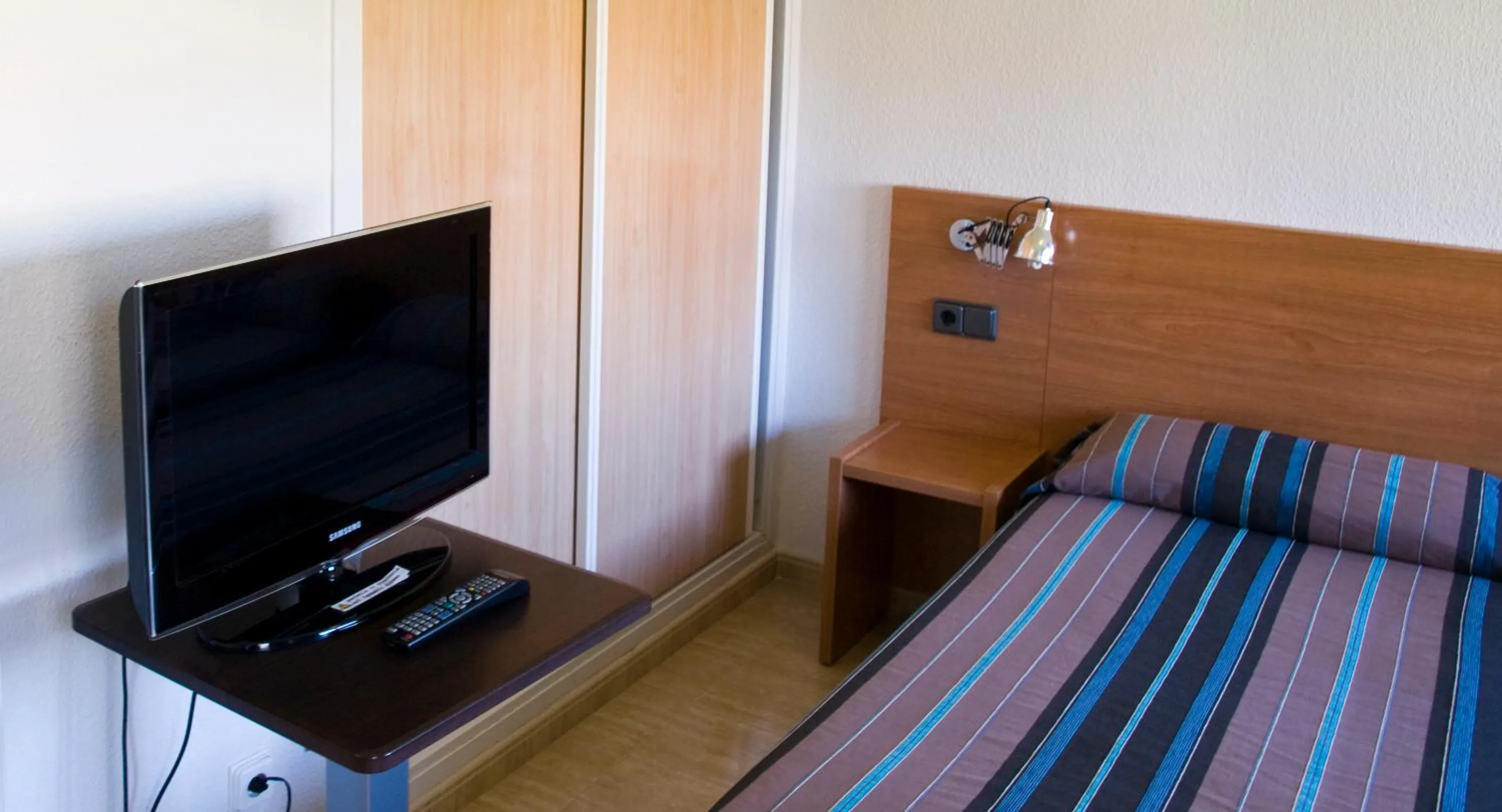 Bedroom in Aparthotel Villas La Manga
