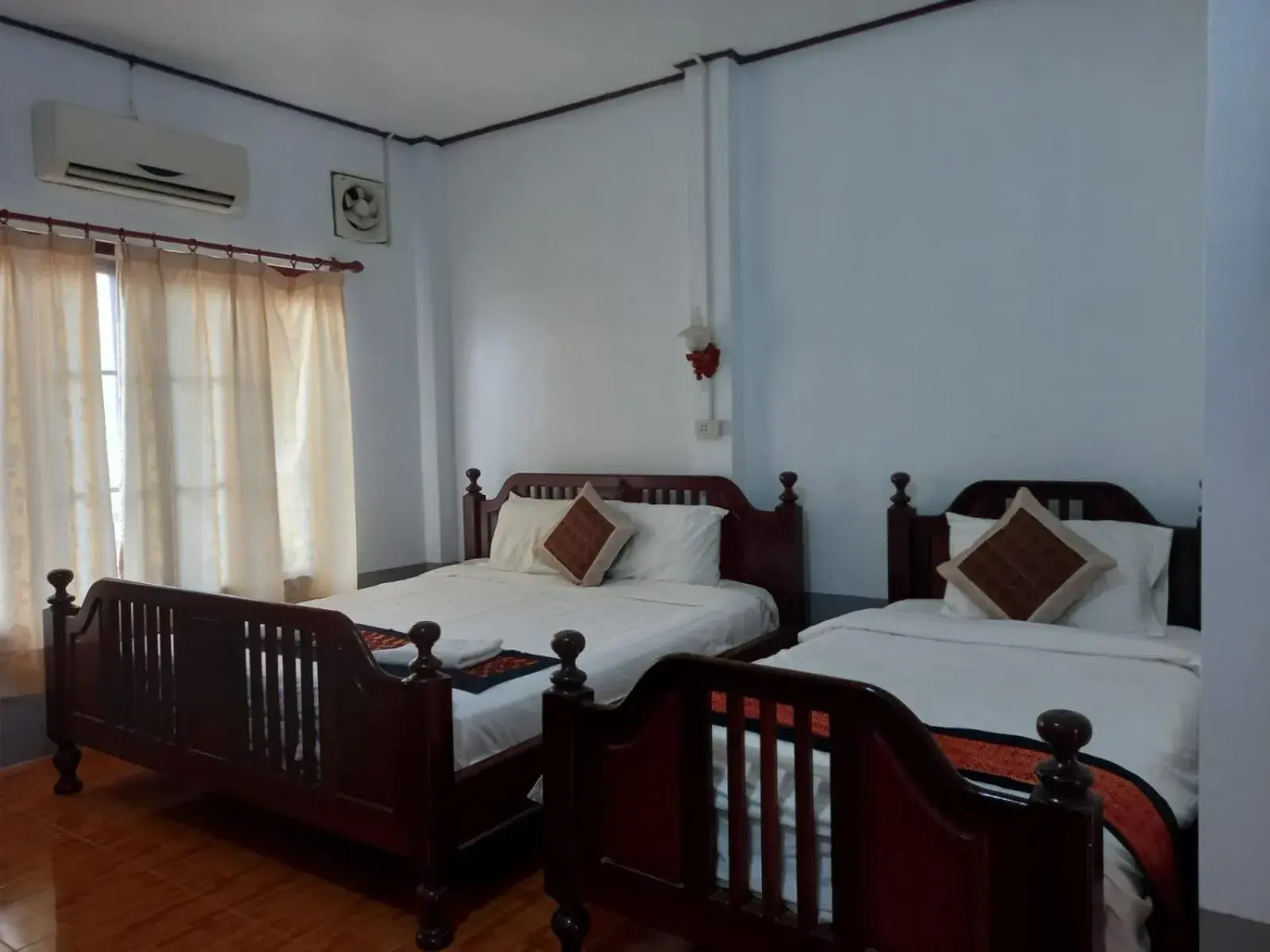 Triple Room in Riverside Garden Hostel Triple Room in Riverside Garden Hostel