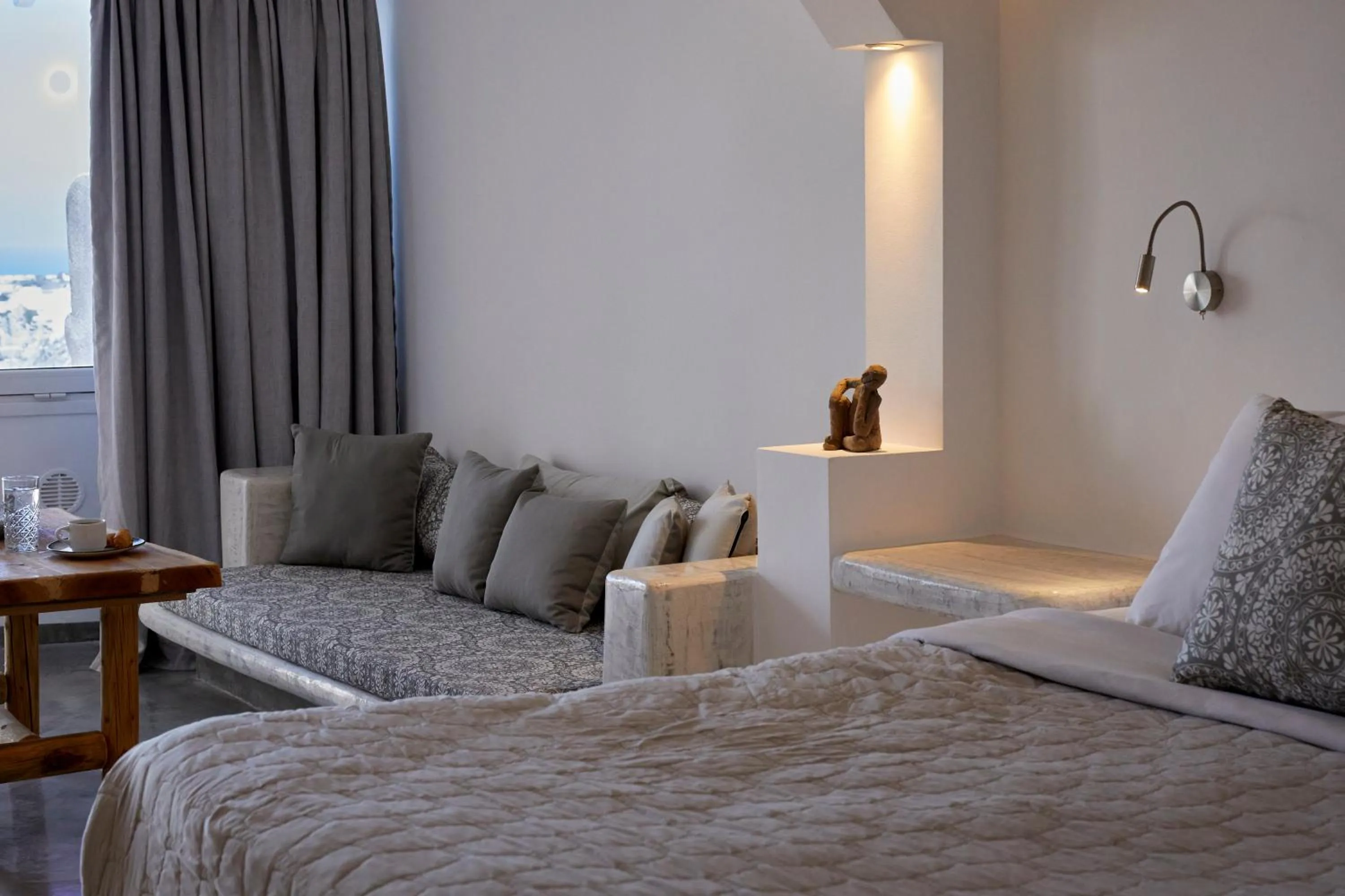 Seating area, Bed in Suites of the Gods Cave Spa Hotel