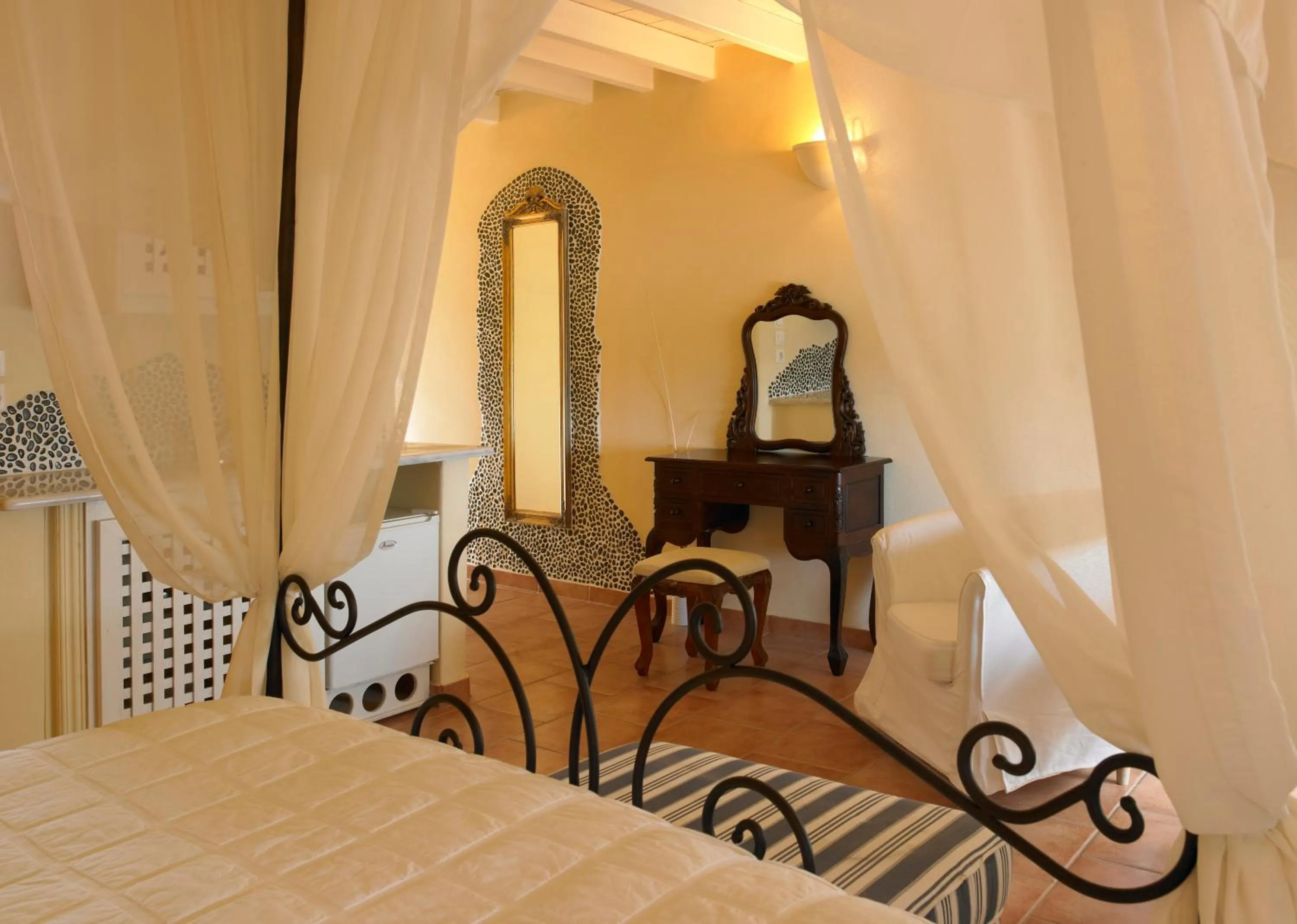 Bed in Suites of the Gods Cave Spa Hotel