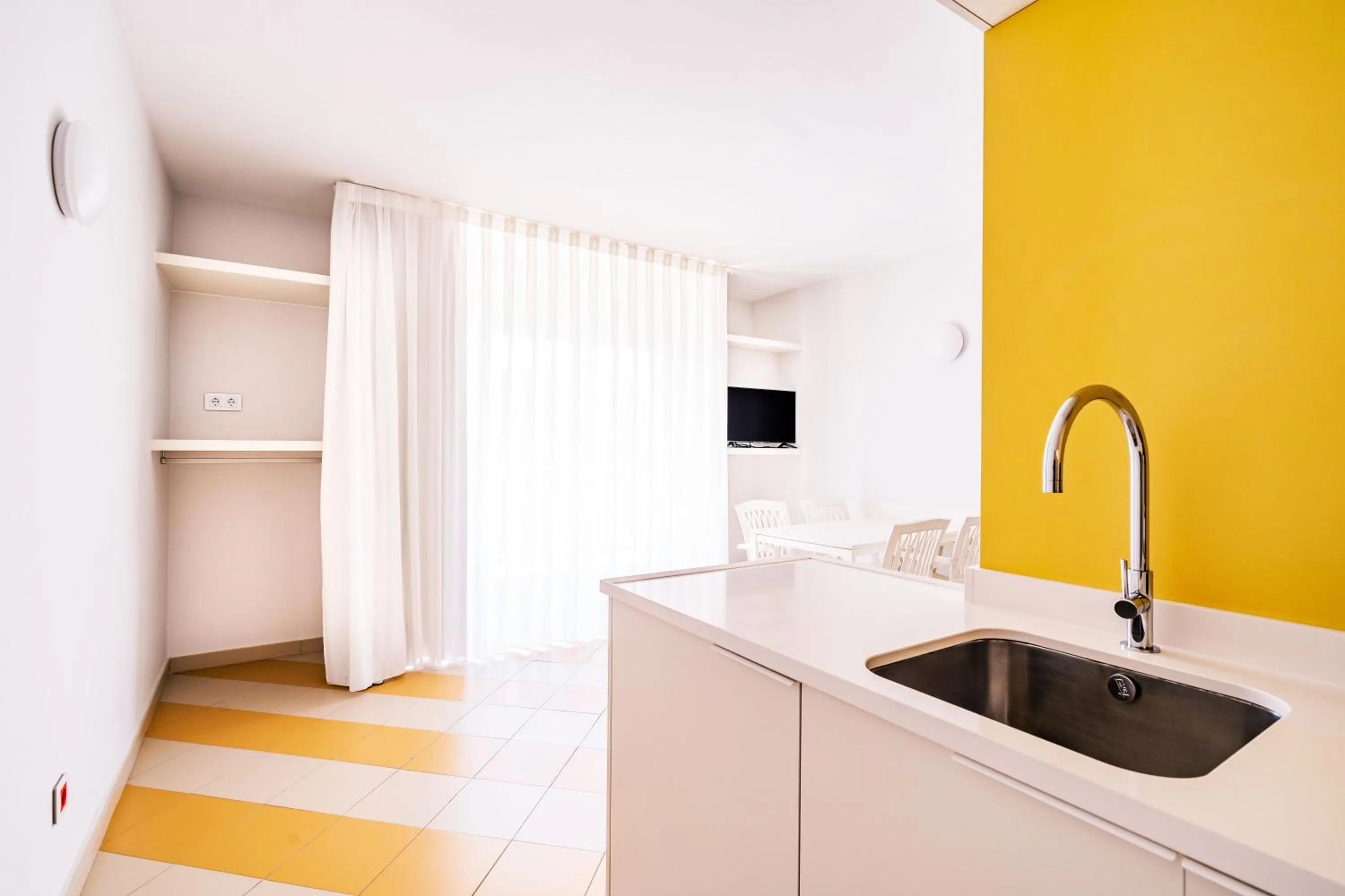 Kitchen or kitchenette in Apartamentos Sunway Amapola