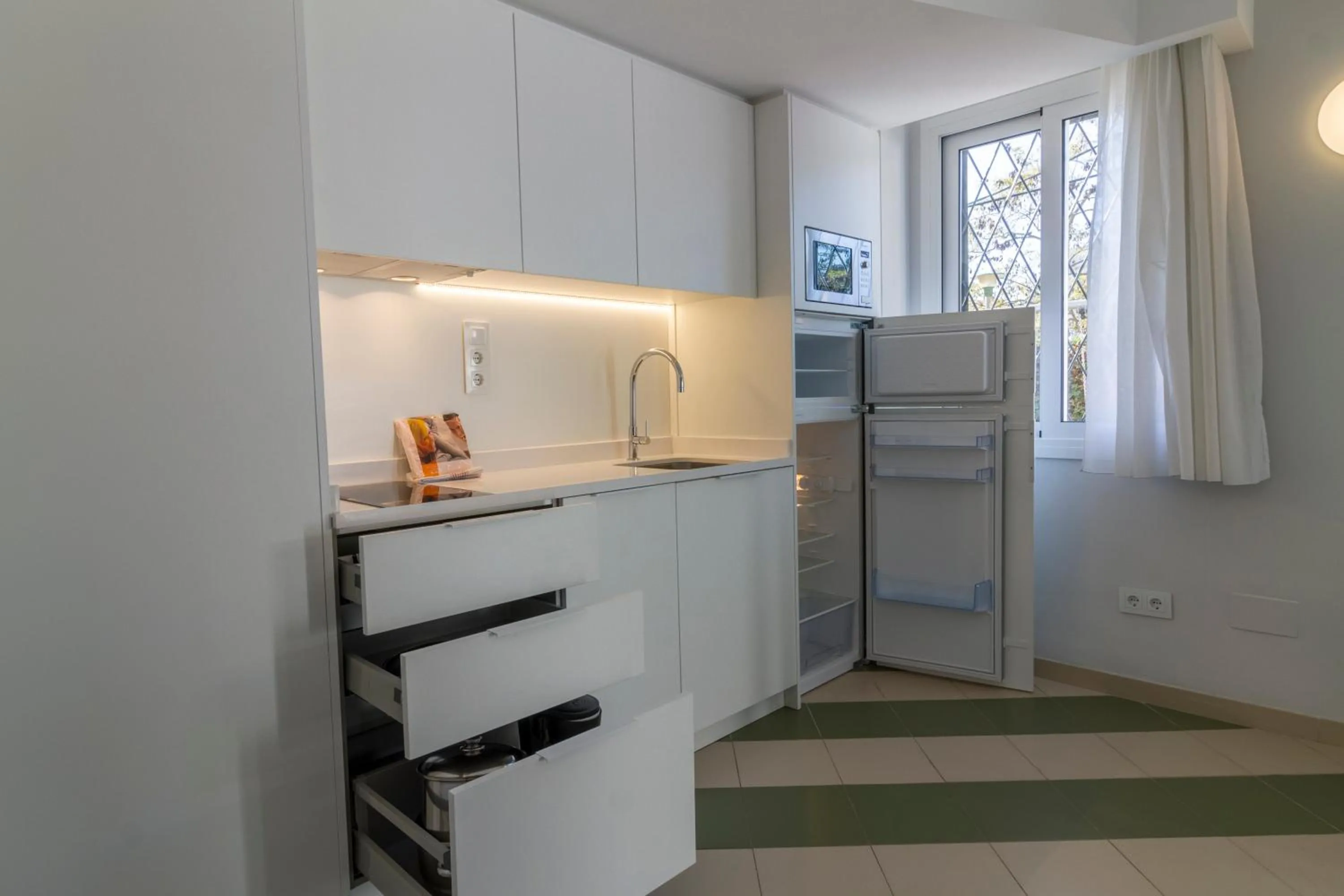kitchen in Apartamentos Sunway Amapola