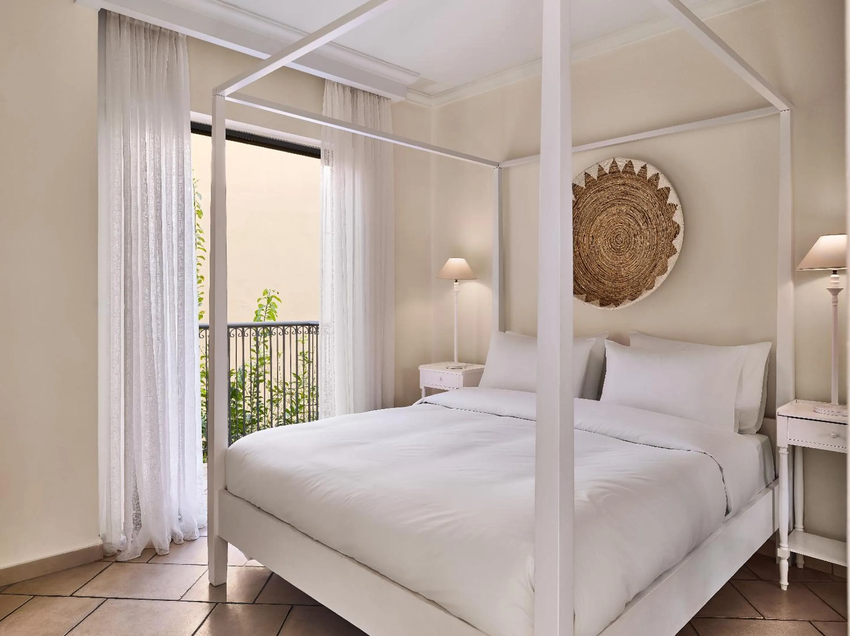 Bed in Grecotel Plaza Beach House