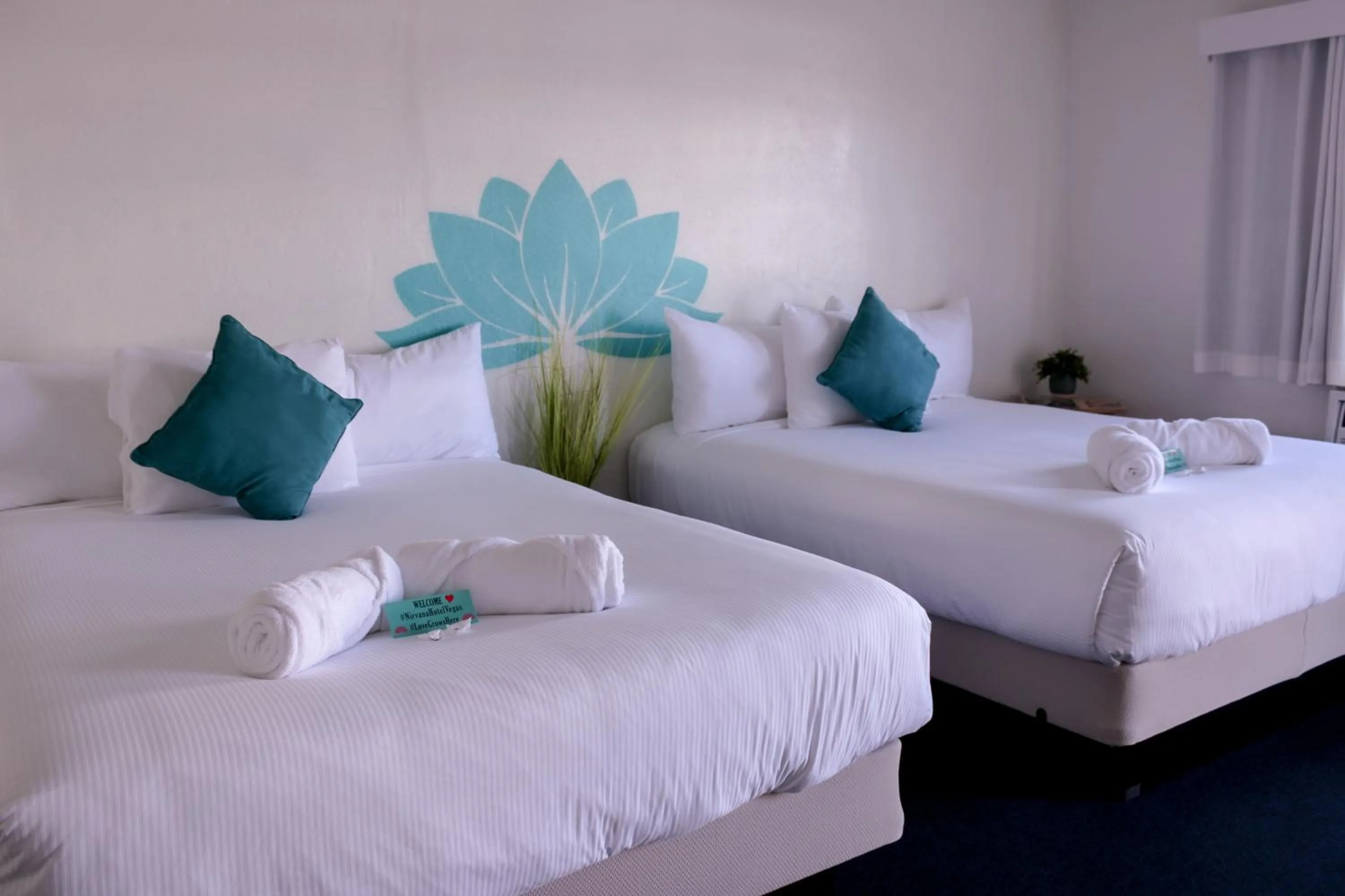 Photo of the whole room, Bed in Nirvana Hotel