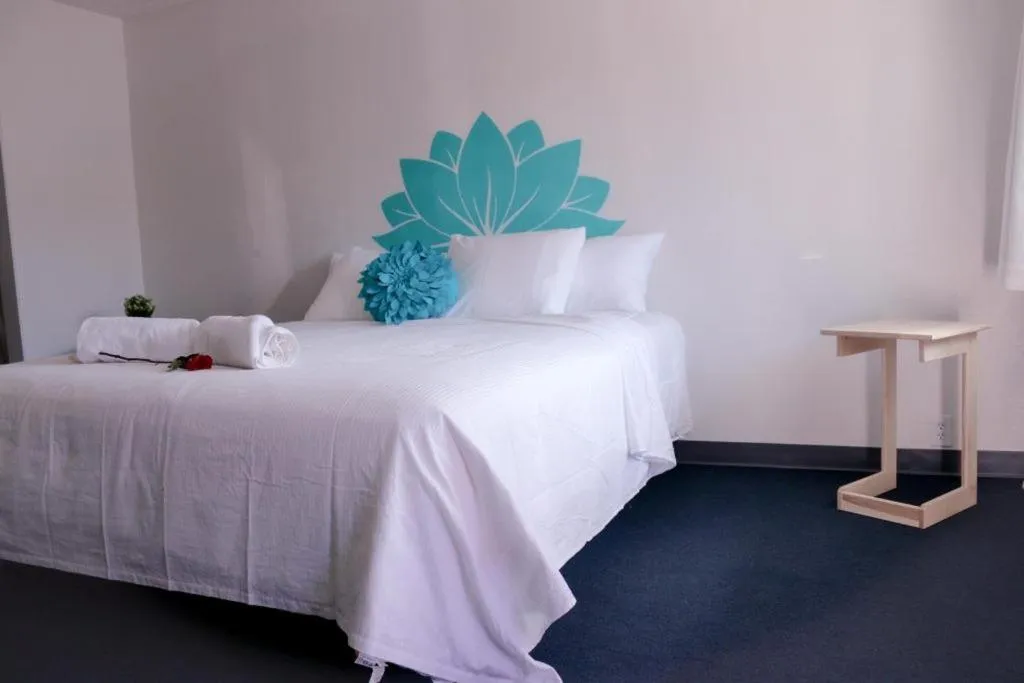 Bed in Nirvana Hotel