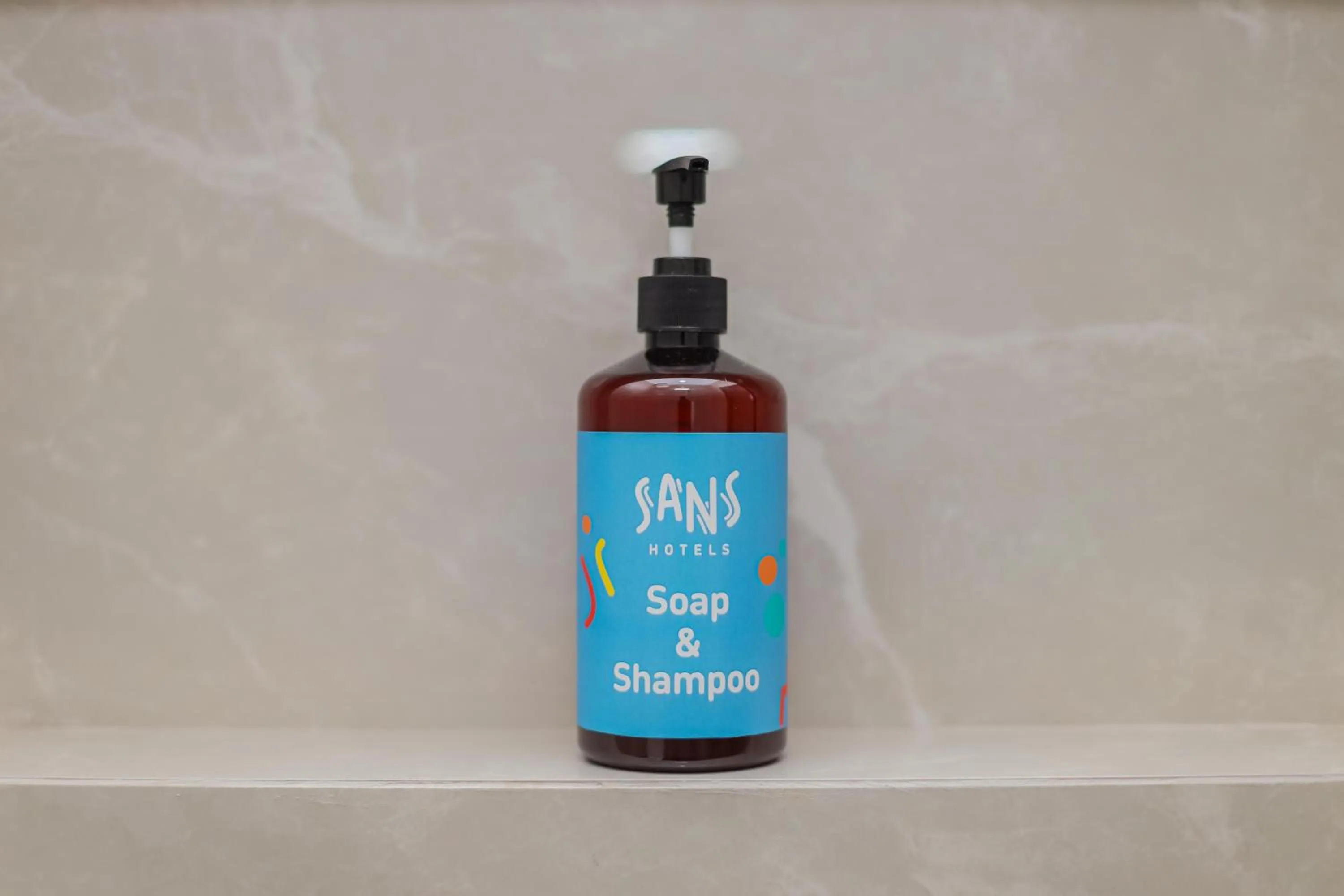 Bathroom in Sans Hotel Clover Ace Surabaya by RedDoorz