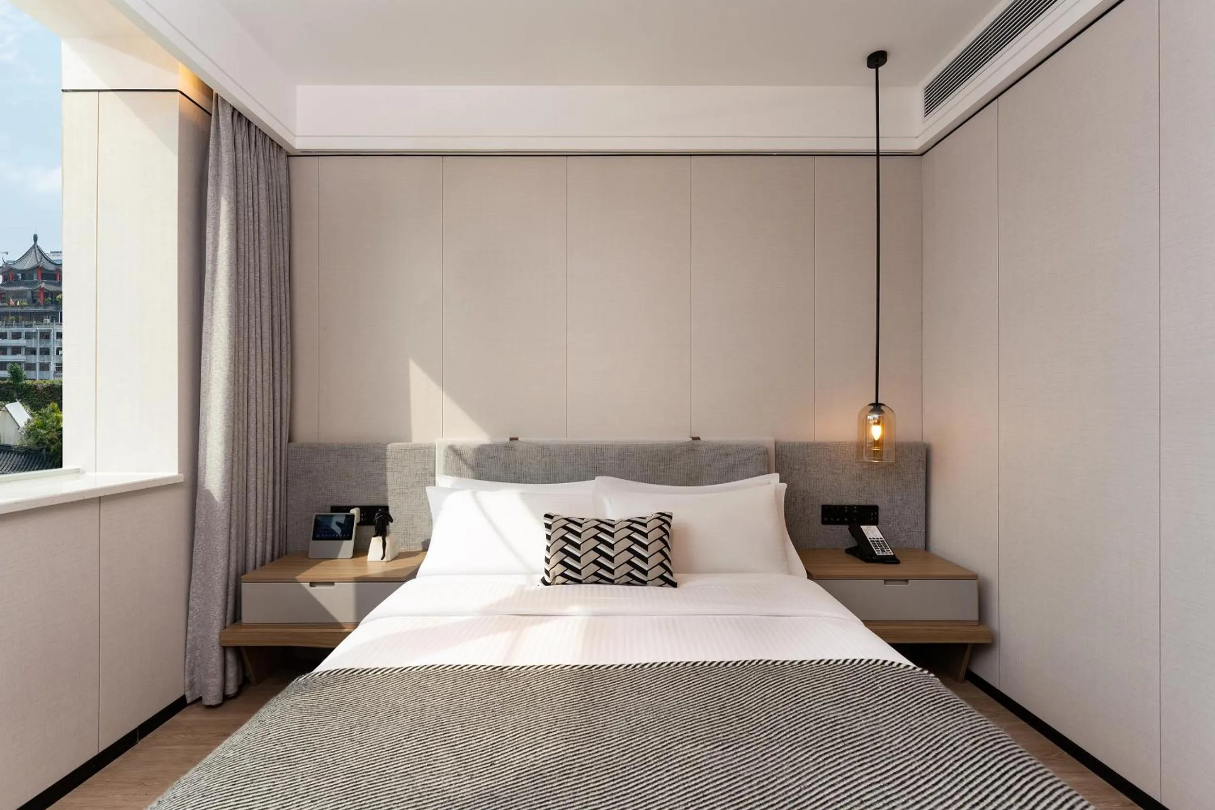Bed in CM Serviced Apartment Shenzhen Dongmen