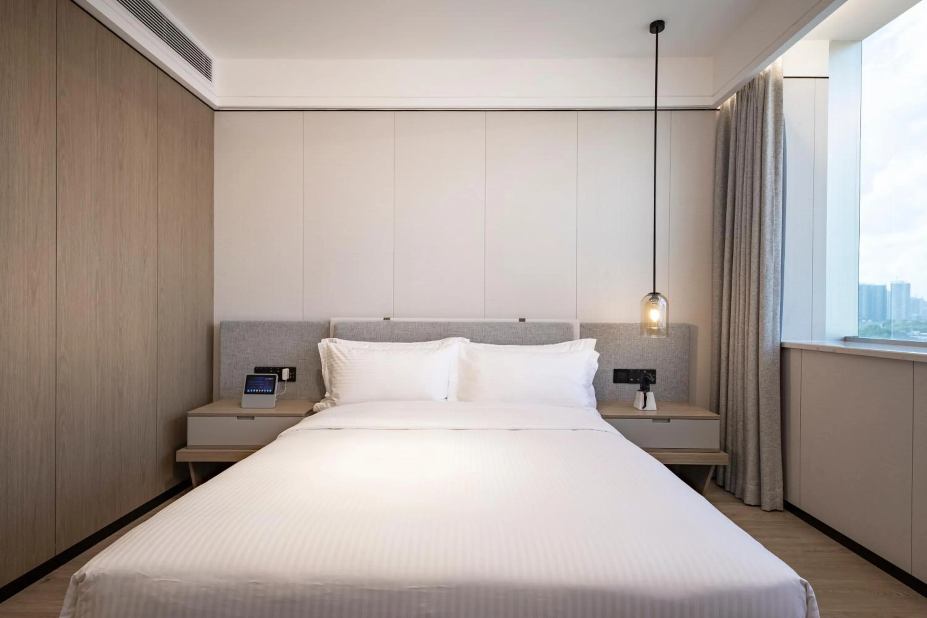 Bed in CM Serviced Apartment Shenzhen Dongmen