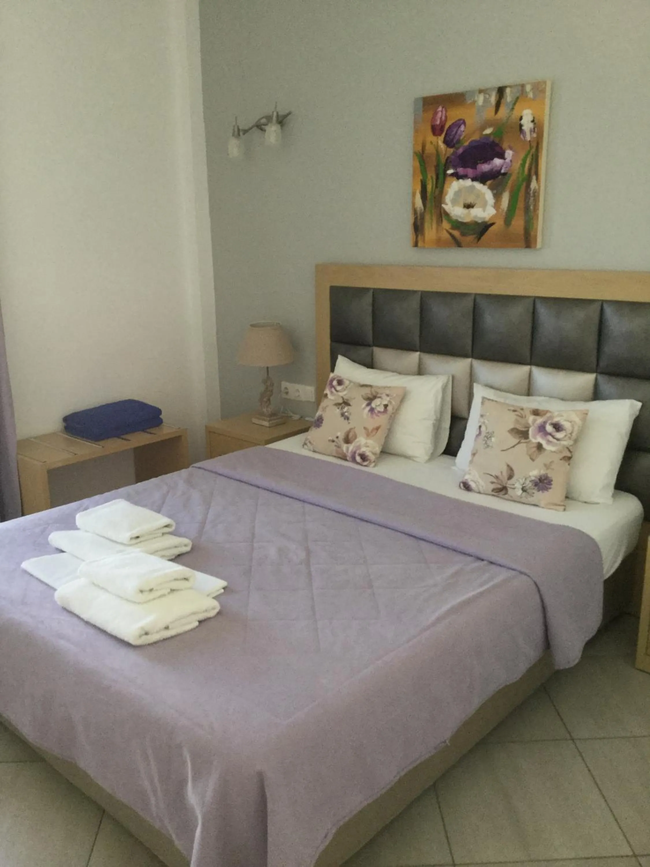 Bed in Rita's Place Hotel