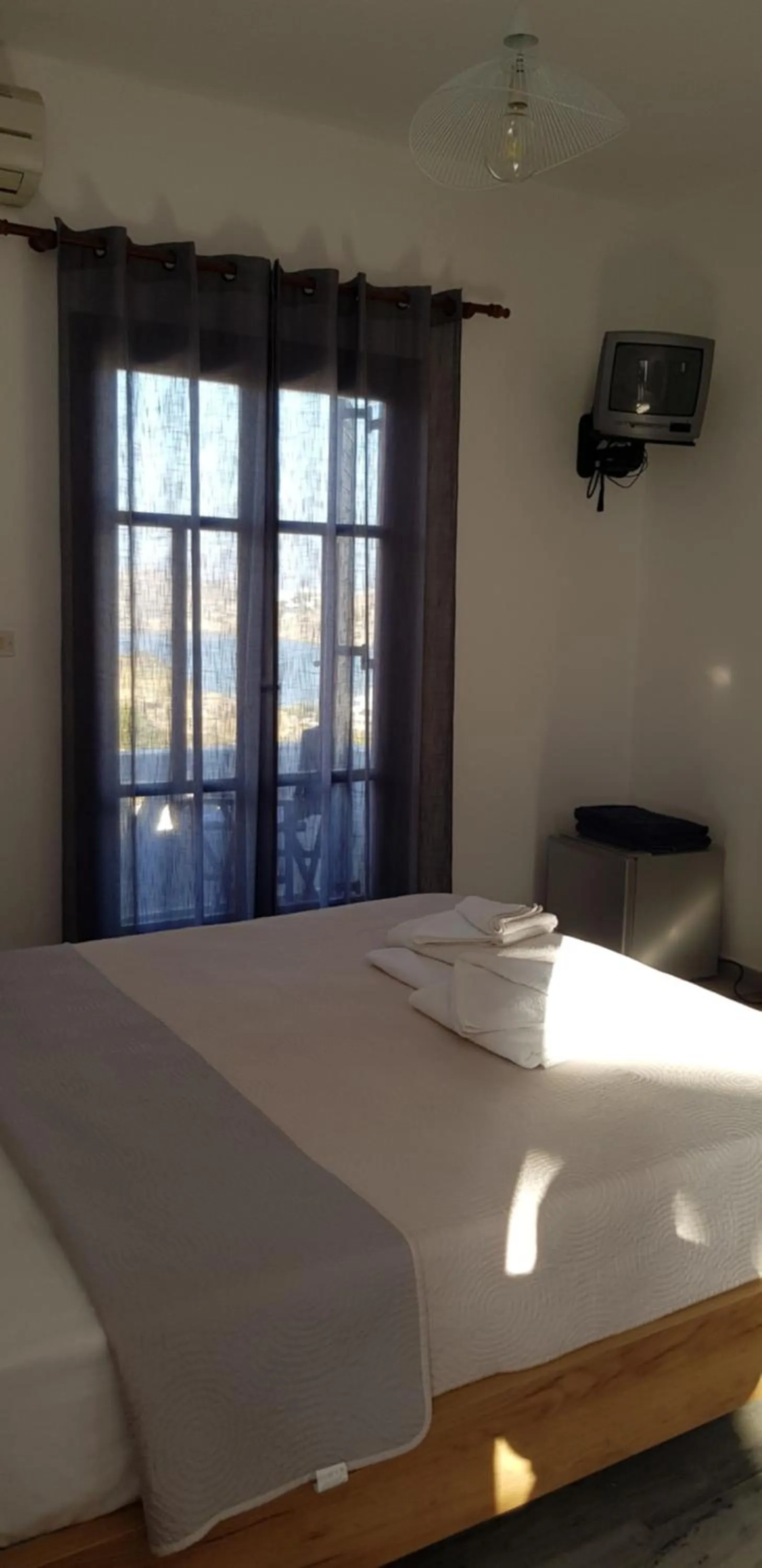 Bed in Rita's Place Hotel