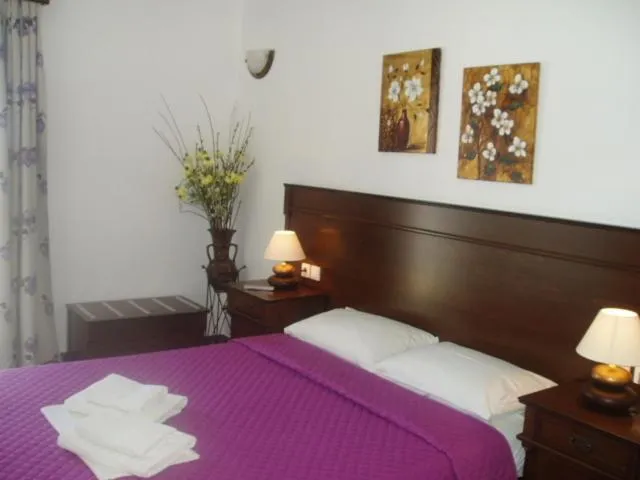 Bedroom in Rita's Place Hotel