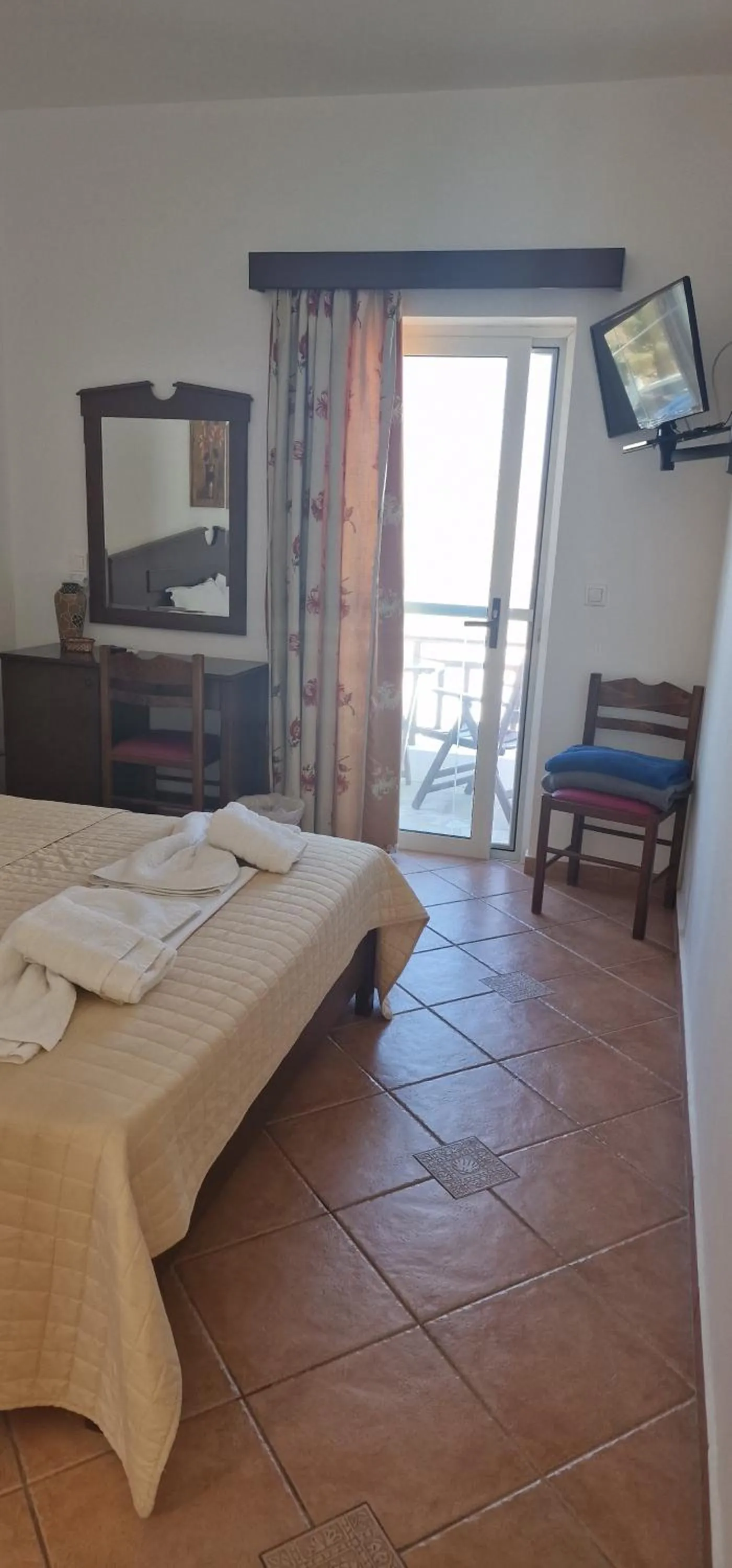 Bed in Rita's Place Hotel