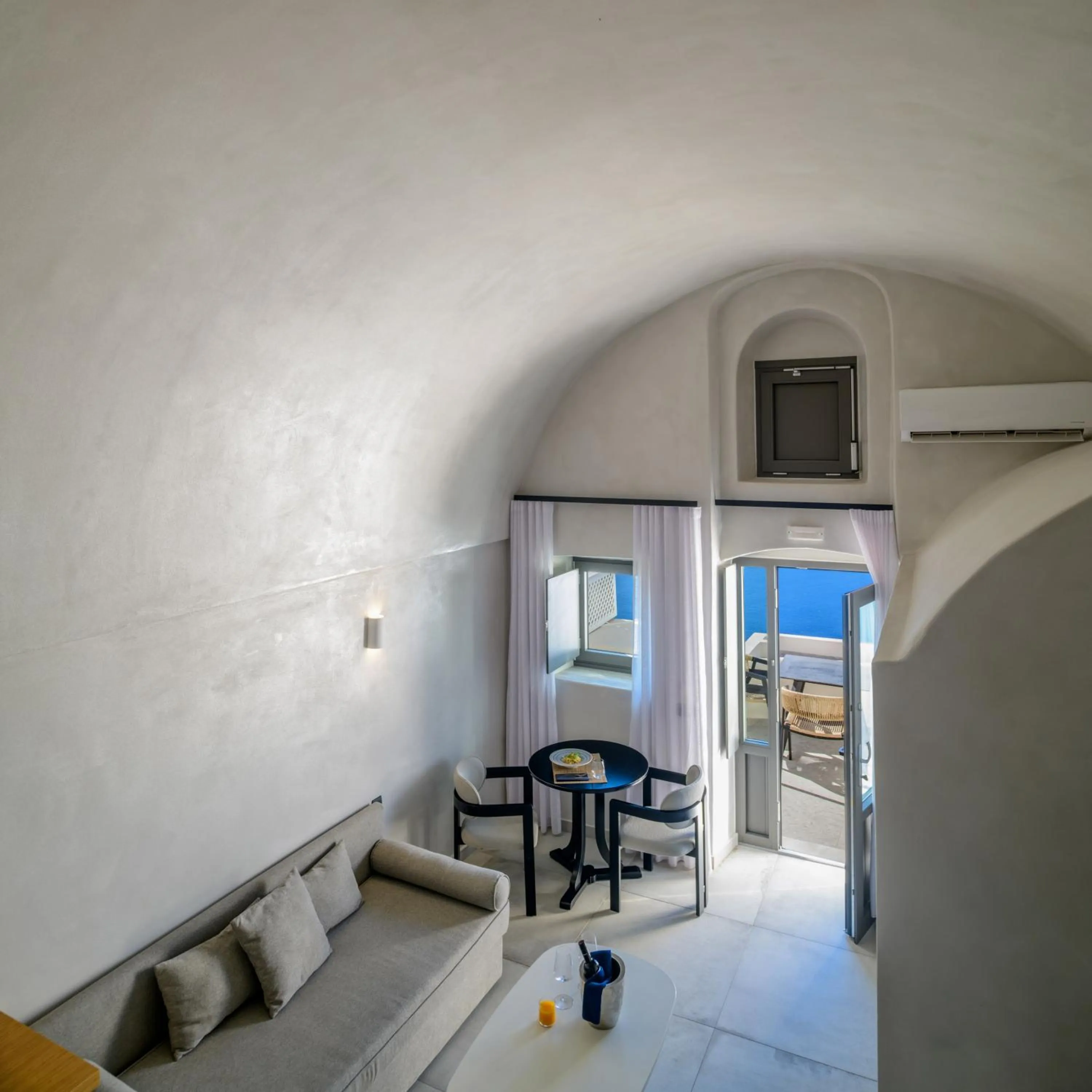 Seating area, Bed in Andromeda Villas & Spa Resort