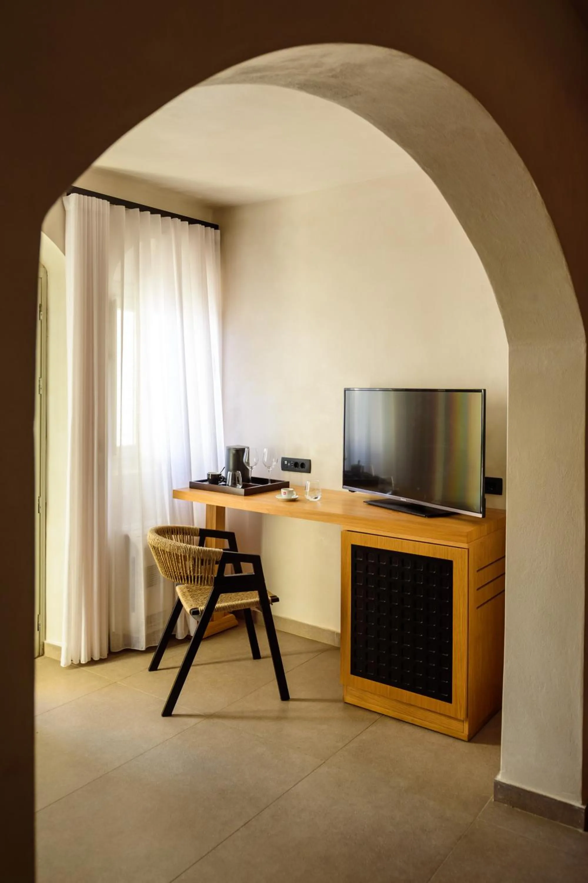 Communal lounge/ TV room in Andromeda Villas & Spa Resort