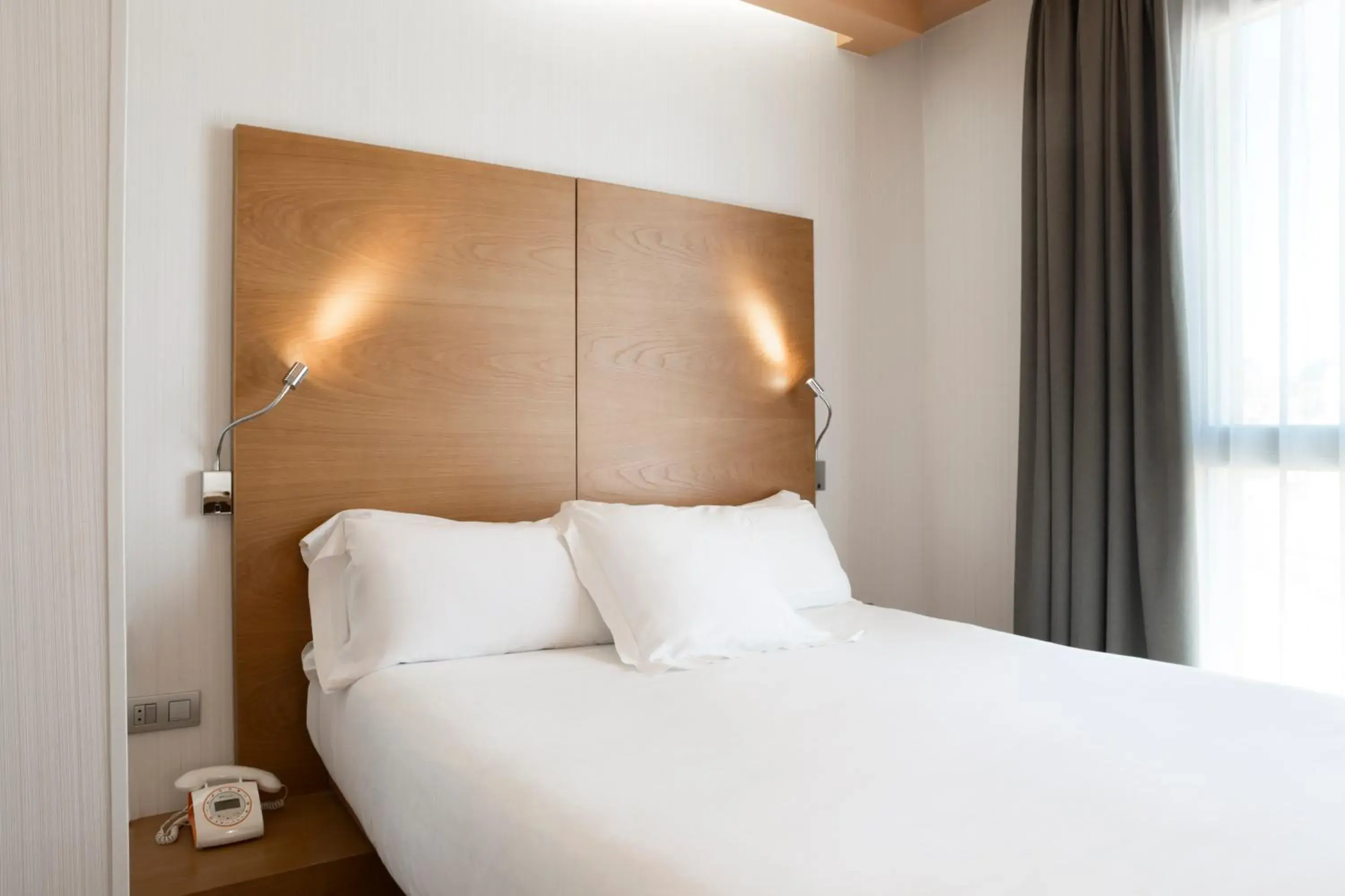 Bed in Petit Palace Plaza Málaga Bed in Petit Palace Plaza Málaga