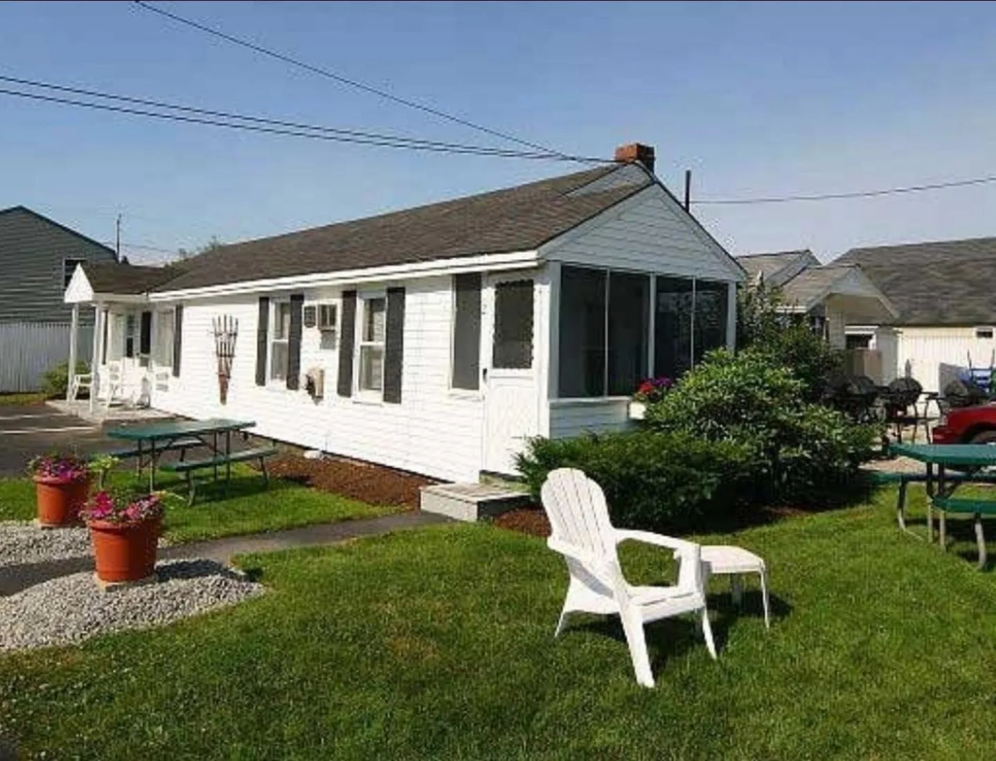 Property building in Carriage House Motel Cottages & Suites