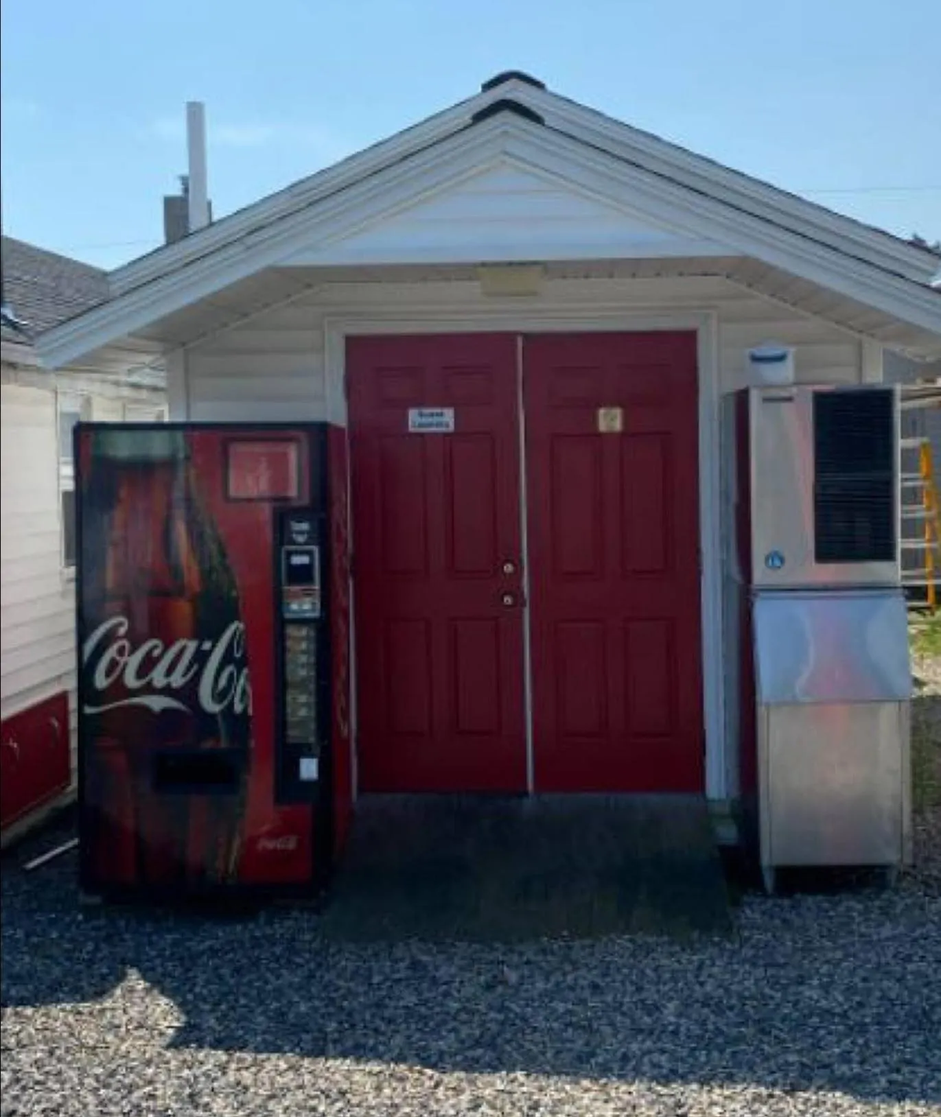 Property building in Carriage House Motel Cottages & Suites