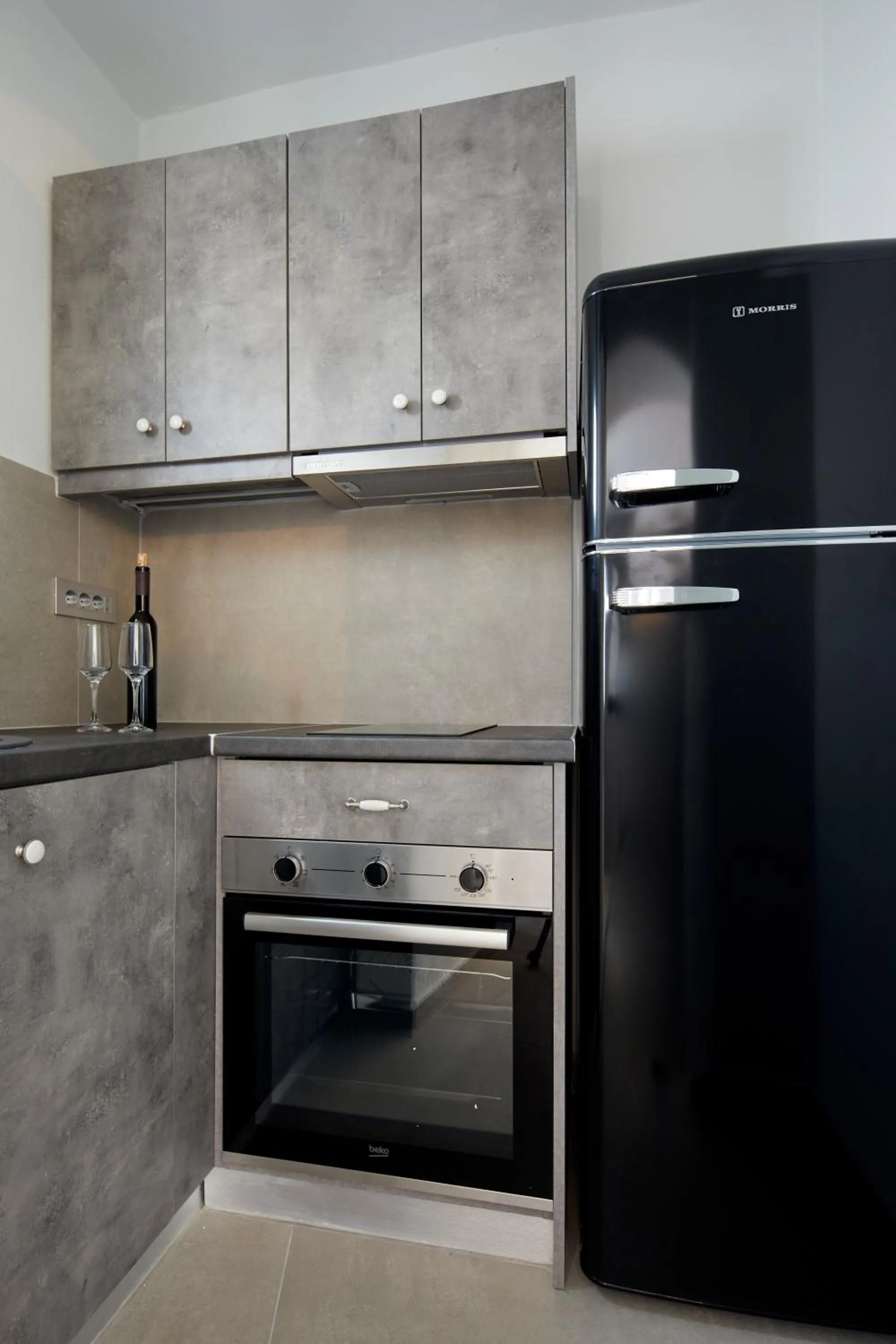 Kitchen or kitchenette in Aecon Suites