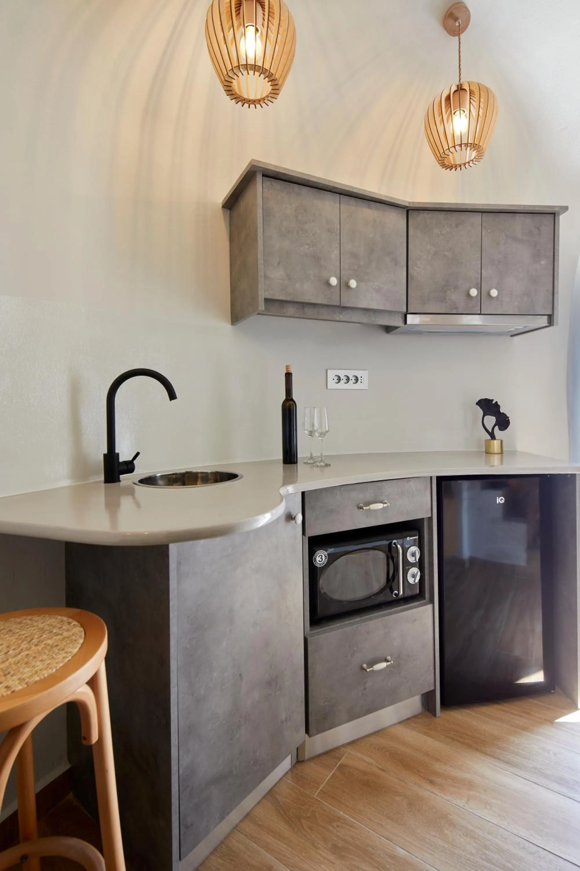 Kitchen or kitchenette in Aecon Suites