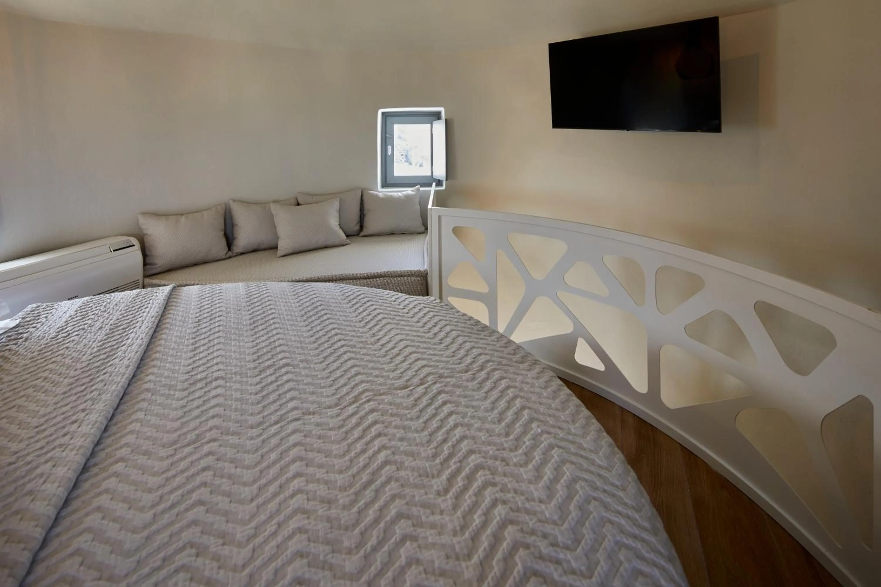 Bed in Aecon Suites