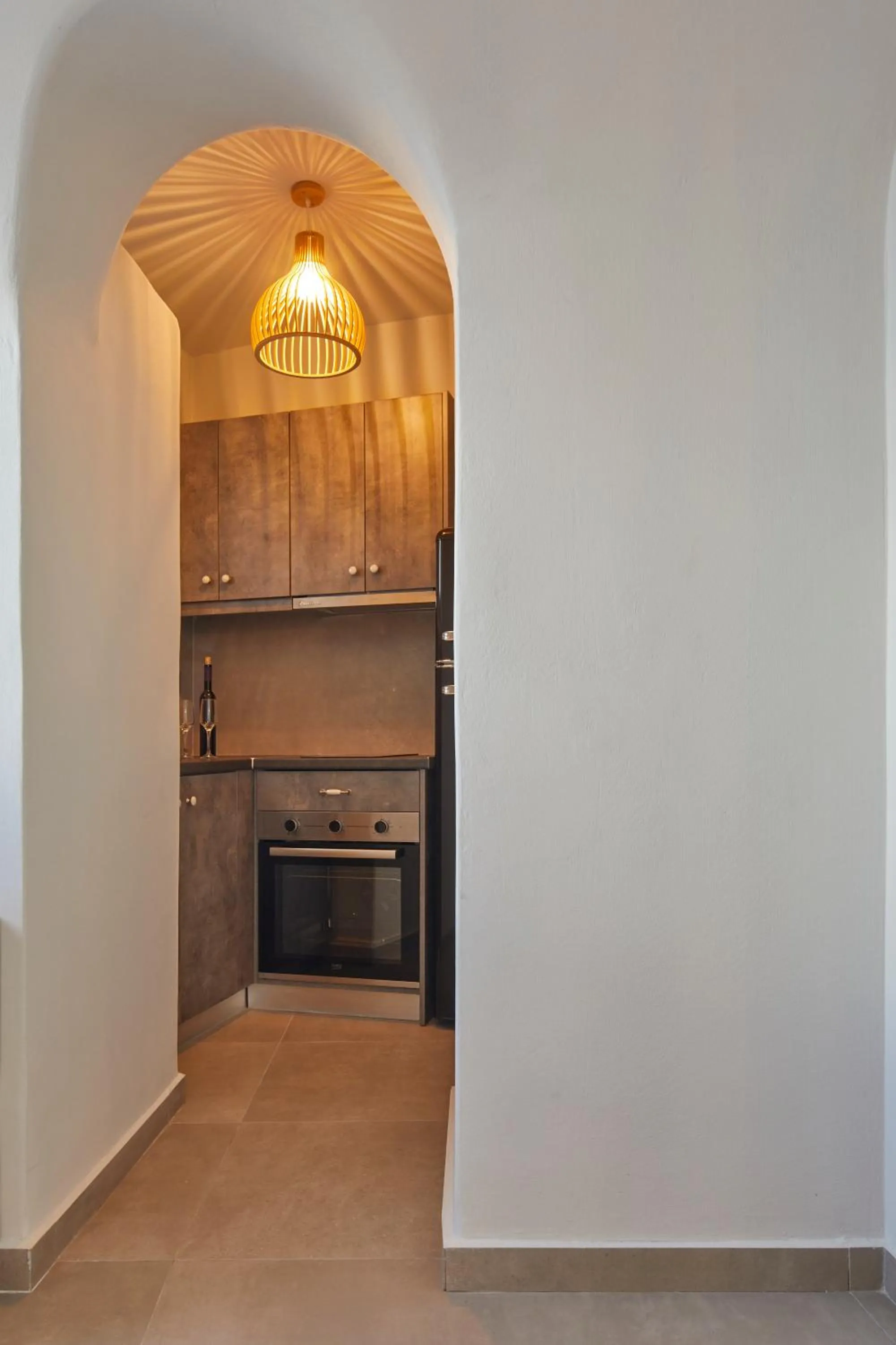 Kitchen or kitchenette in Aecon Suites