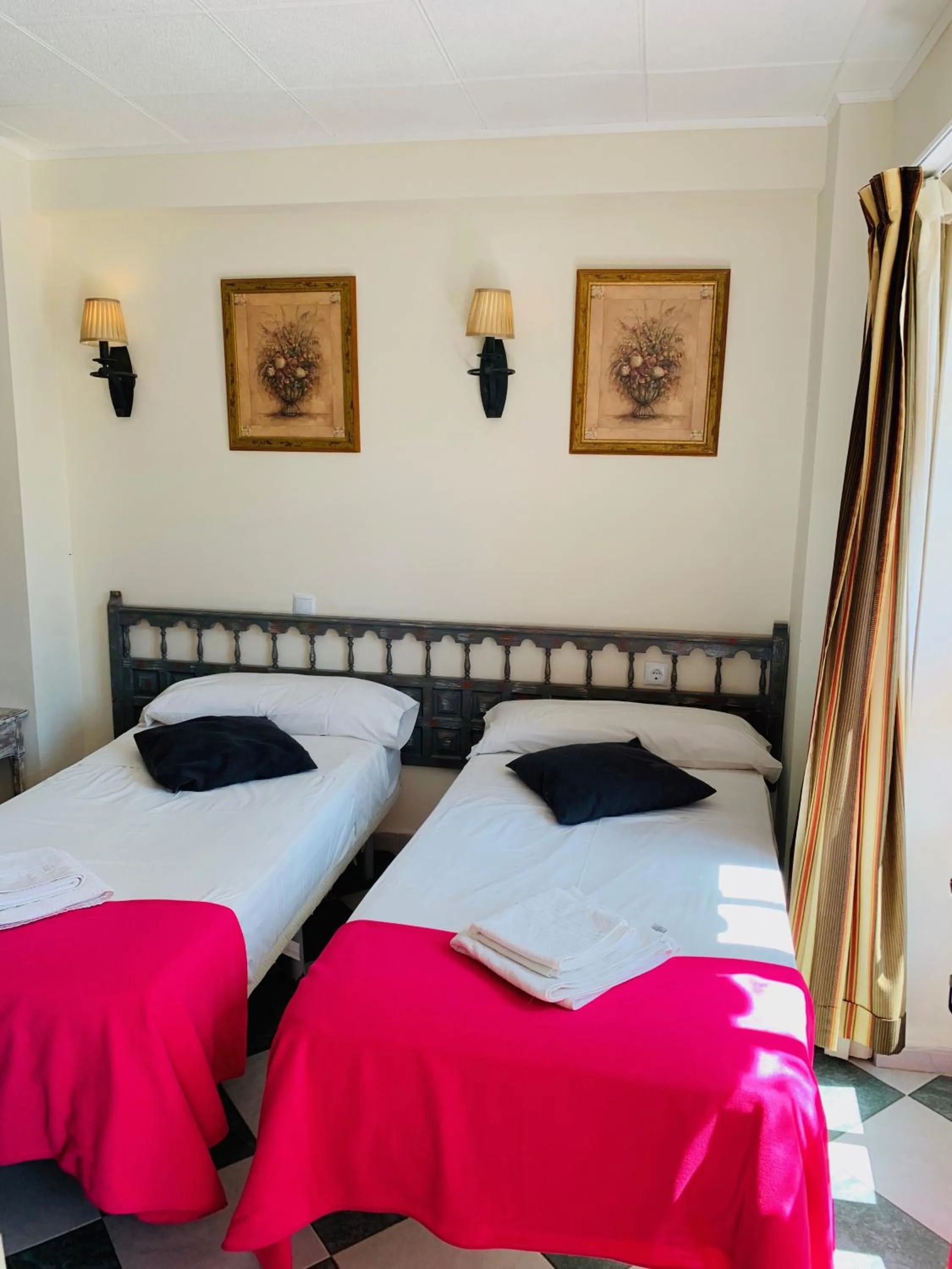 Bed in Pensión Aduar