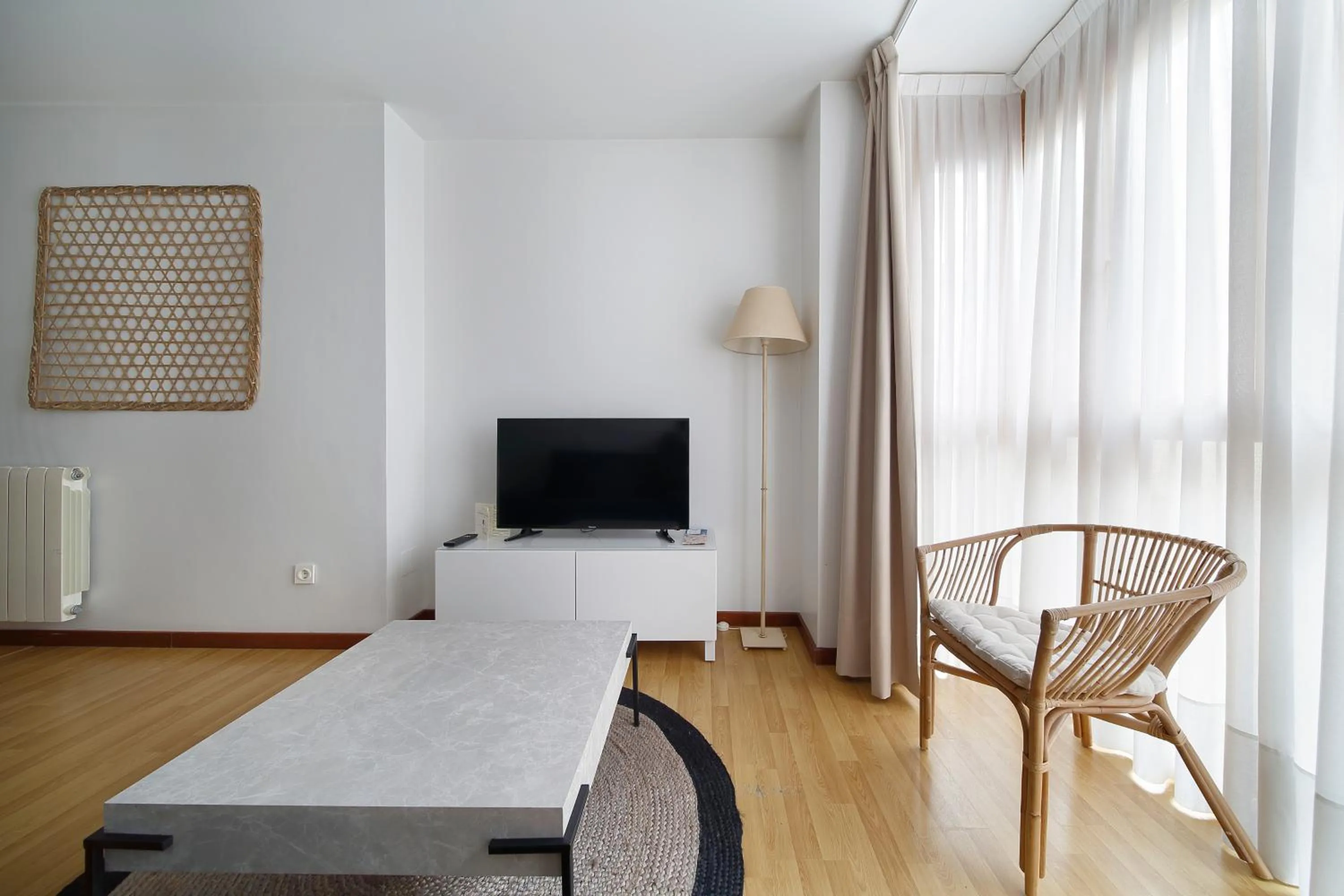 Living room, Bed in Apartamentos Urban Blue, Blue Hotels