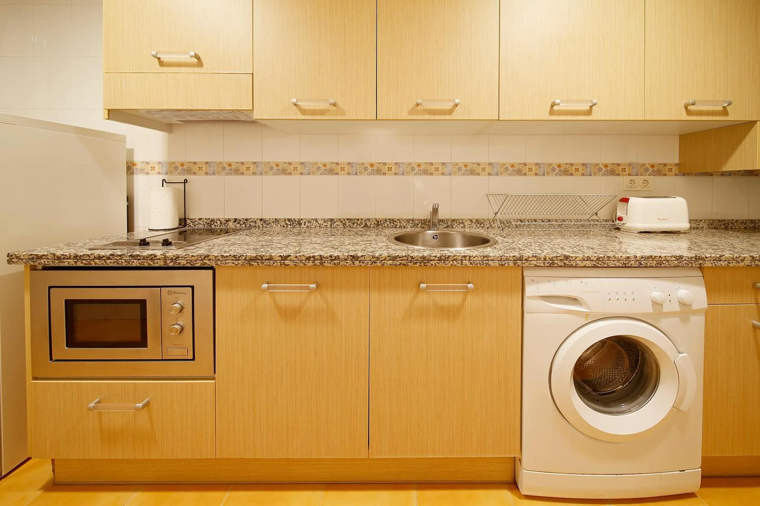 Kitchen or kitchenette in Apartamentos Urban Blue, Blue Hotels