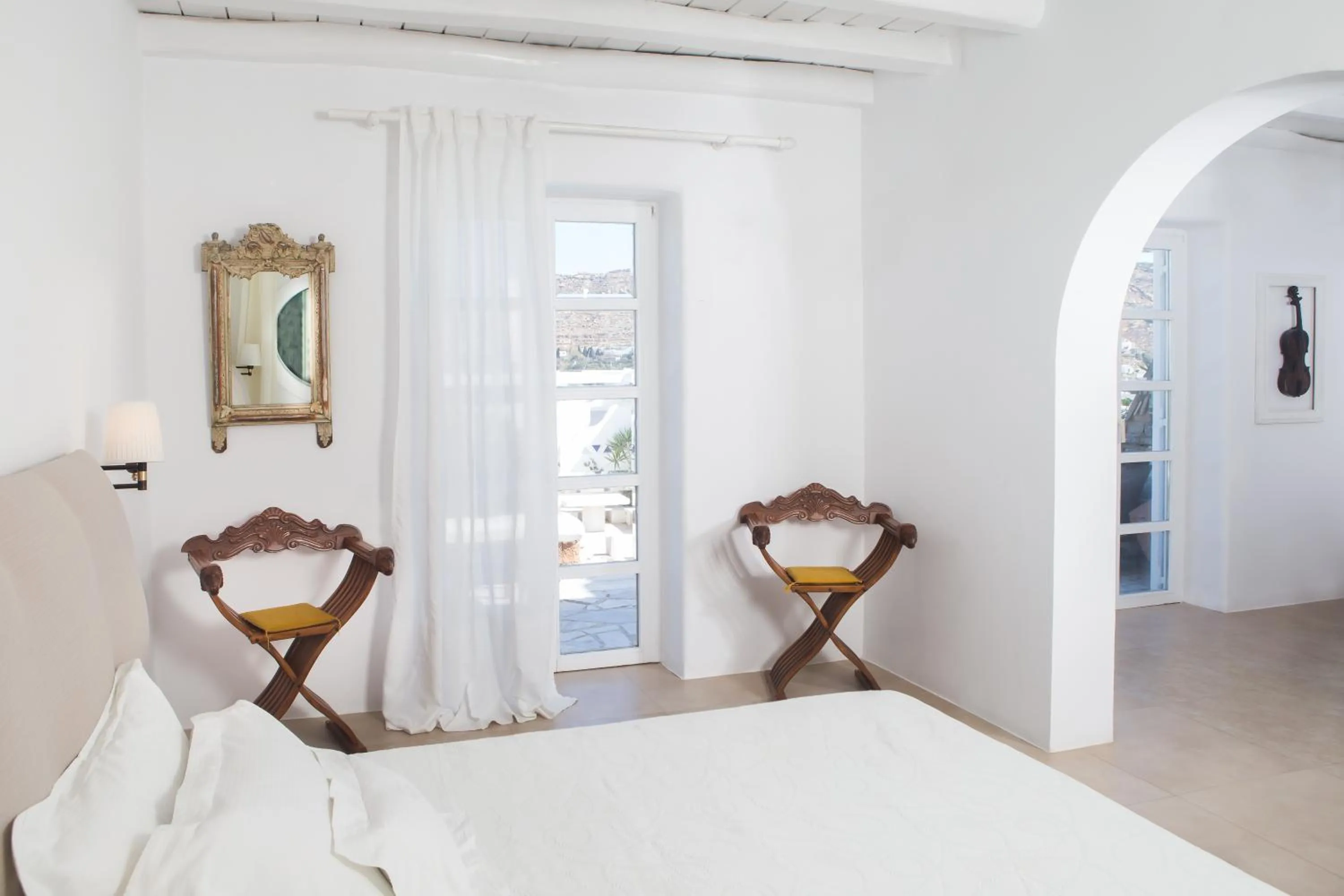 Bedroom, Bed in Kivotos Mykonos - Preferred Hotels & Resorts