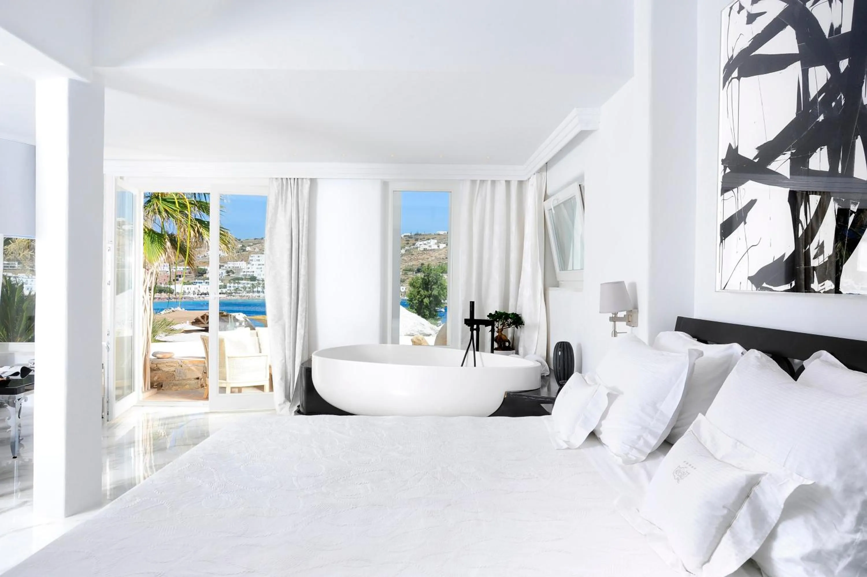 Bedroom, Bed in Kivotos Mykonos - Preferred Hotels & Resorts