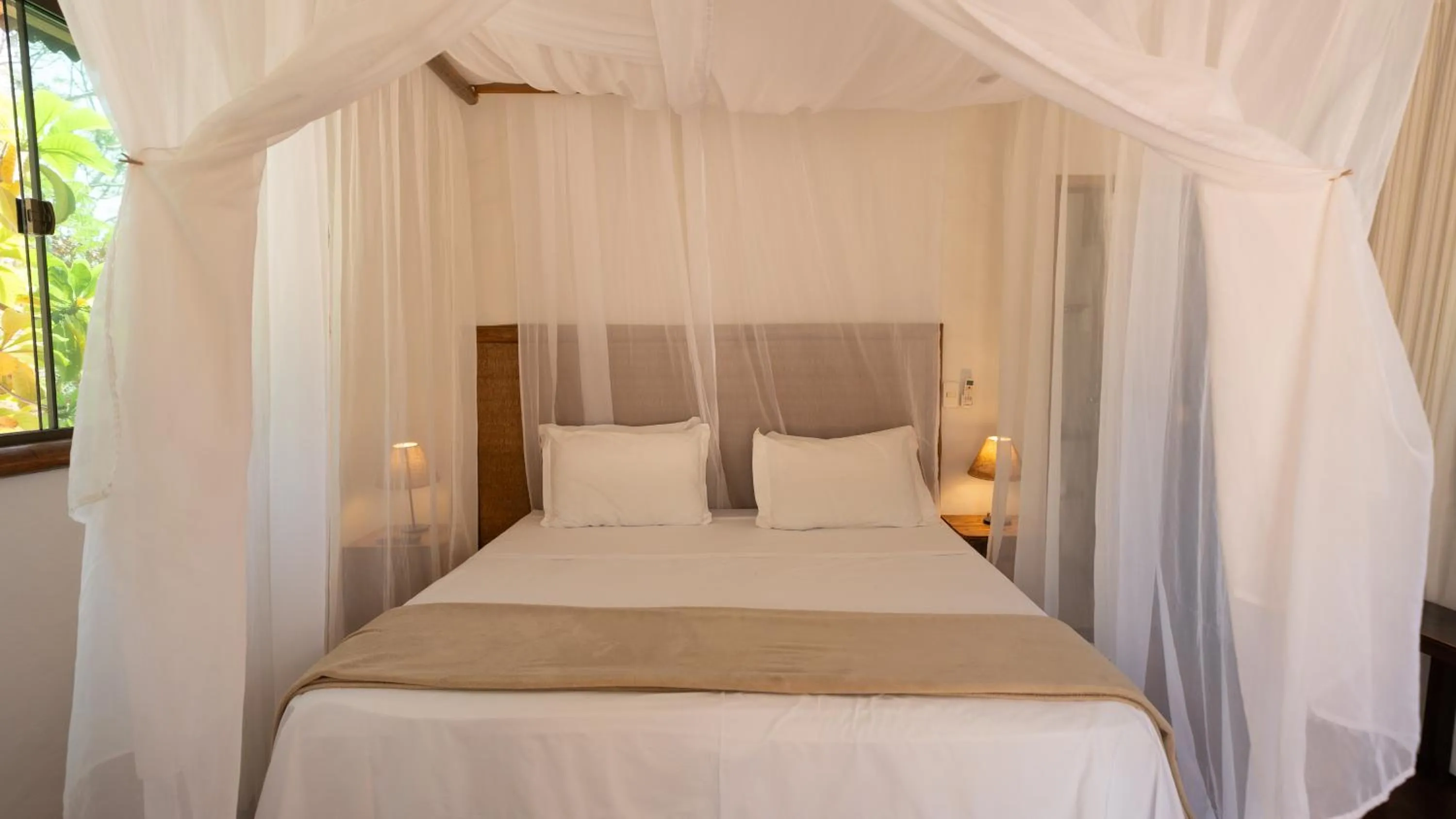 Bed in Baguá Bangalôs