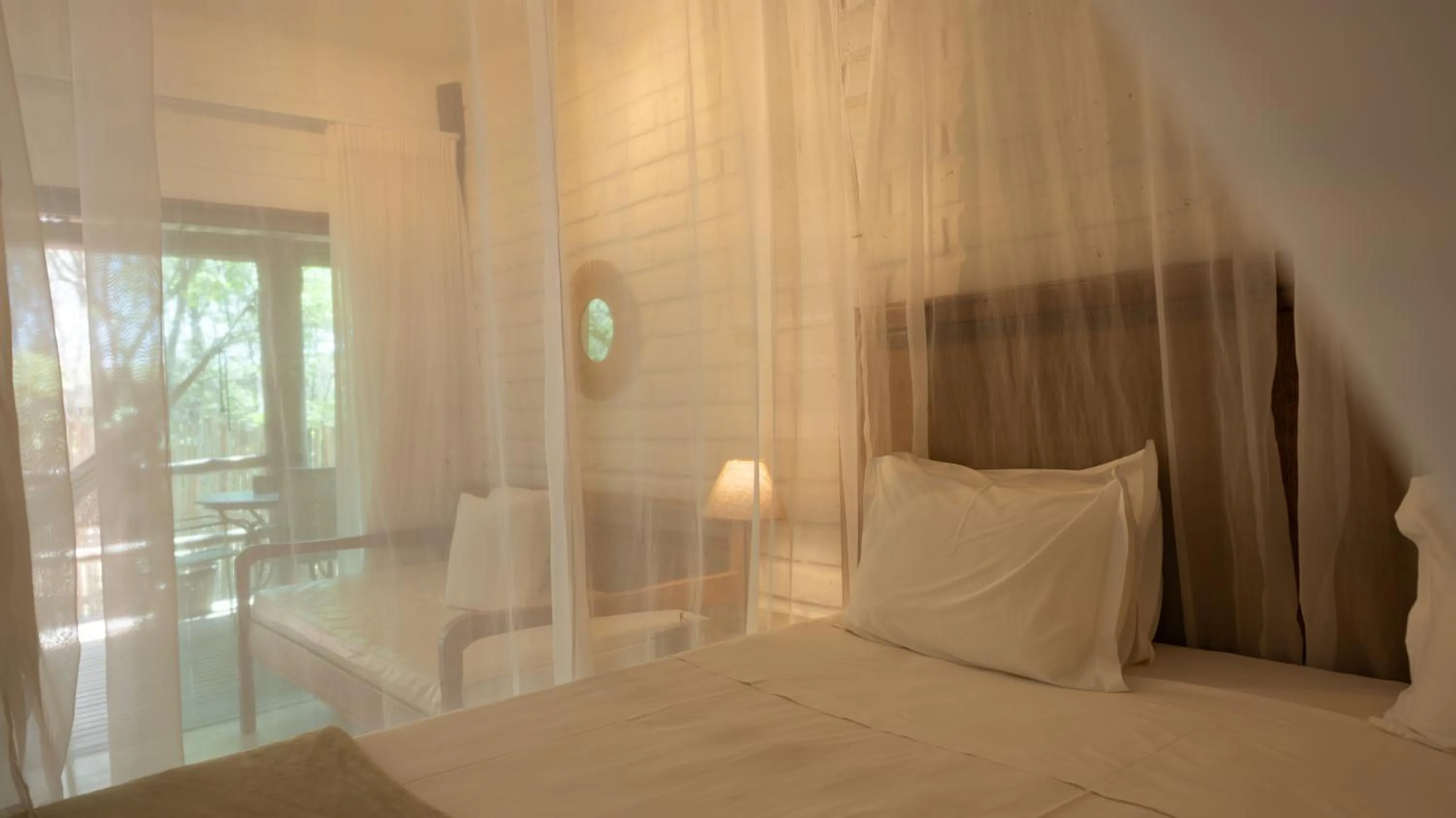 Bed in Baguá Bangalôs