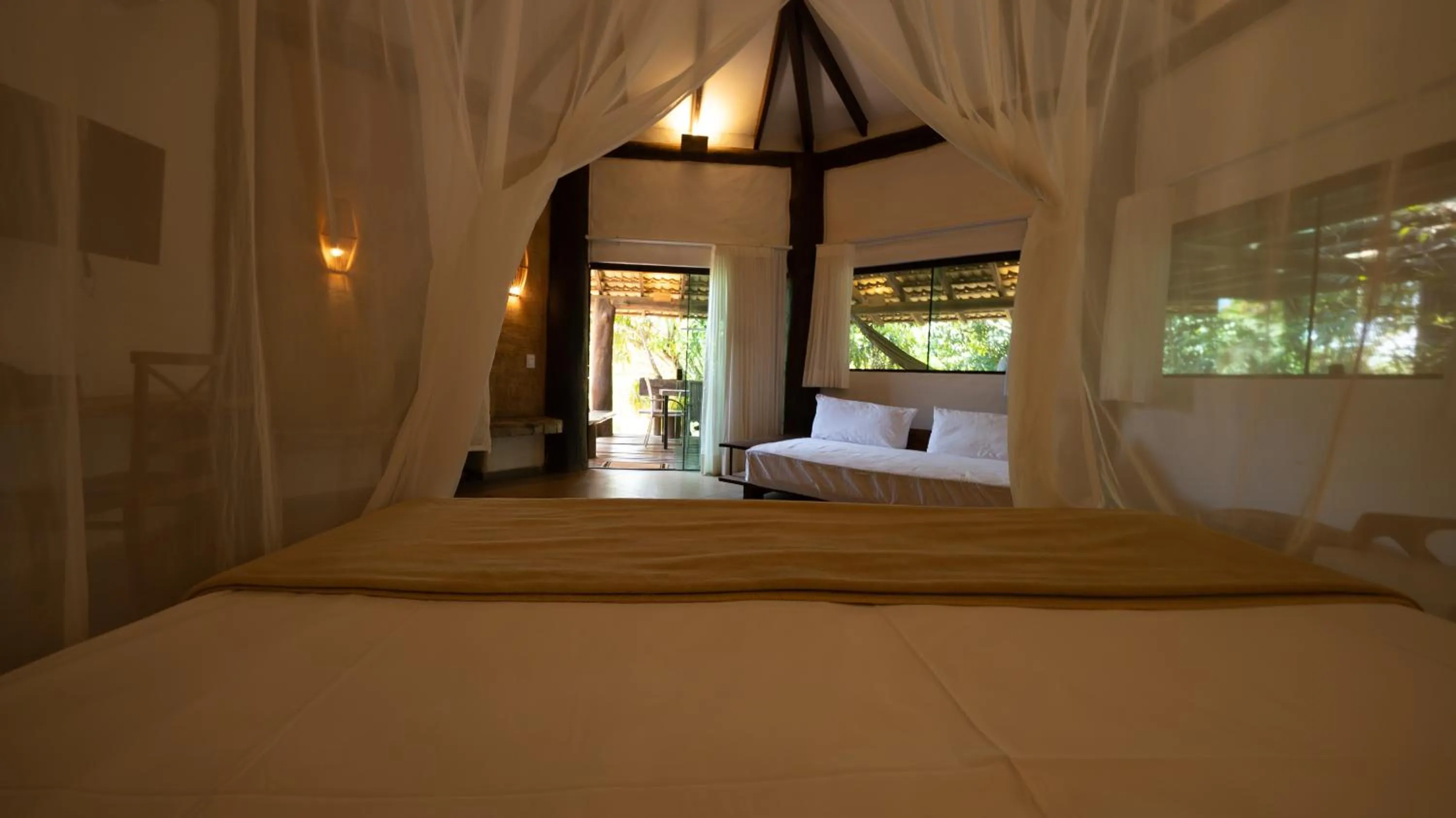 Bed in Baguá Bangalôs