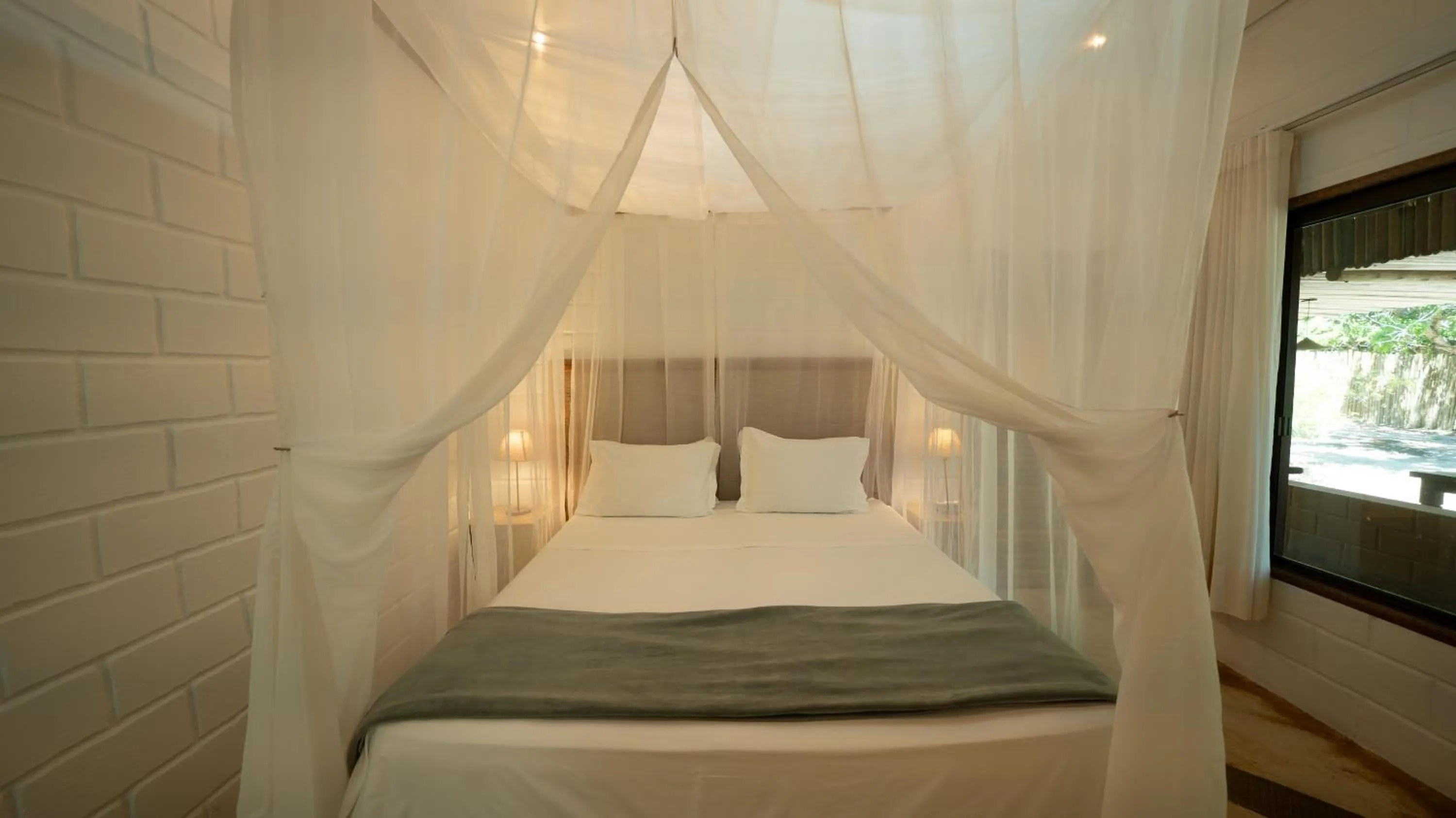 Bed in Baguá Bangalôs