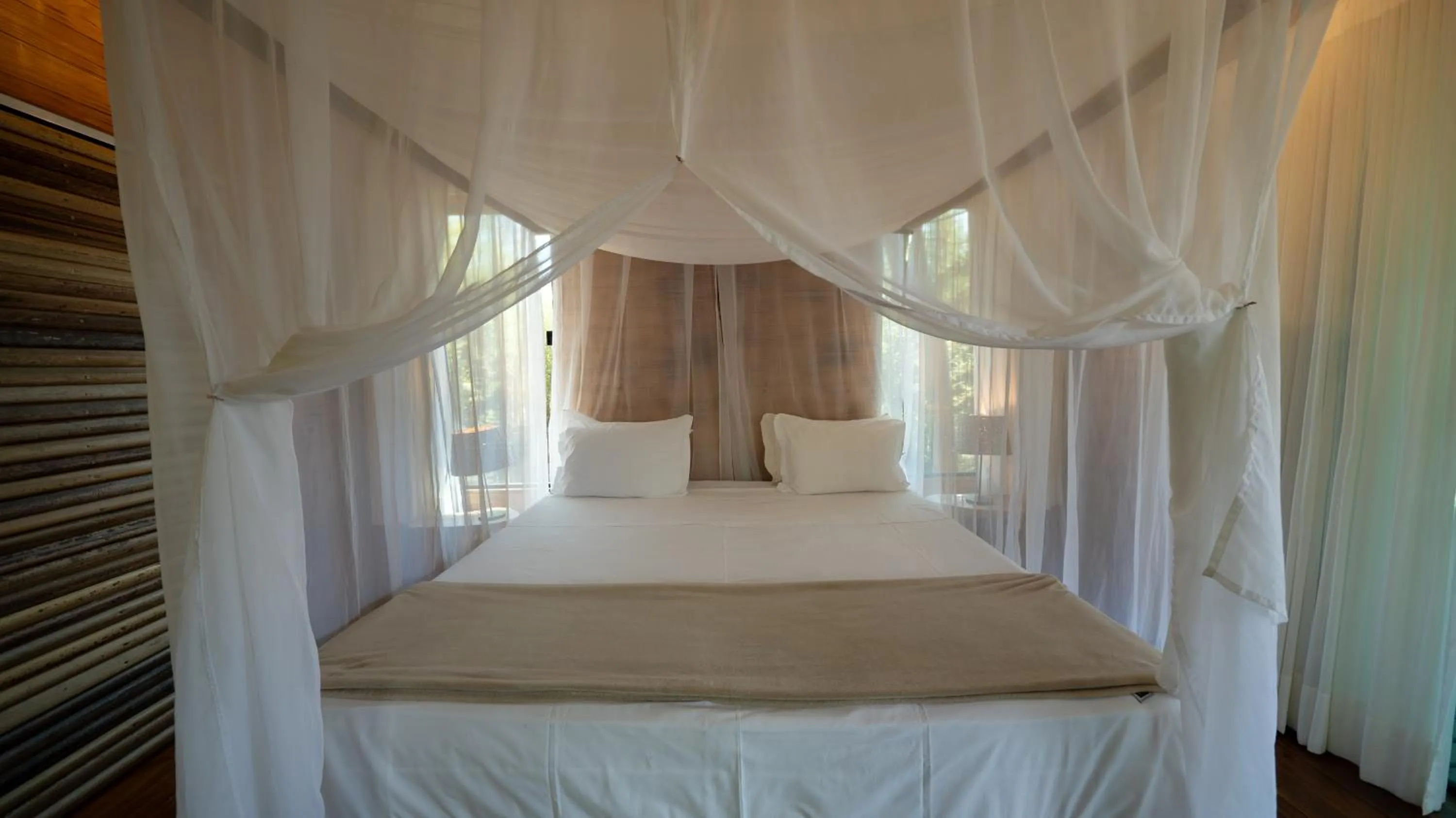 Bed in Baguá Bangalôs