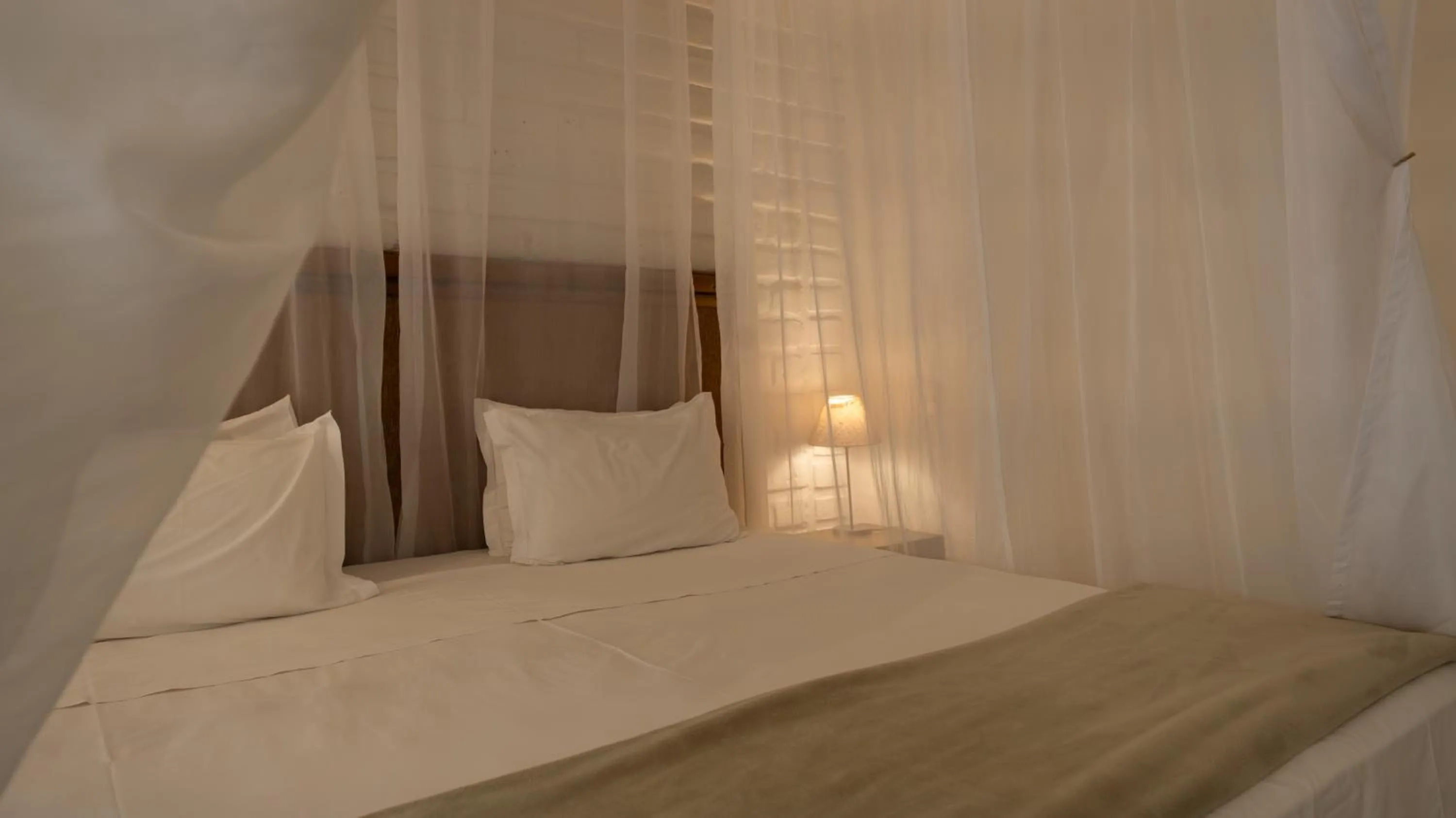 Bed in Baguá Bangalôs