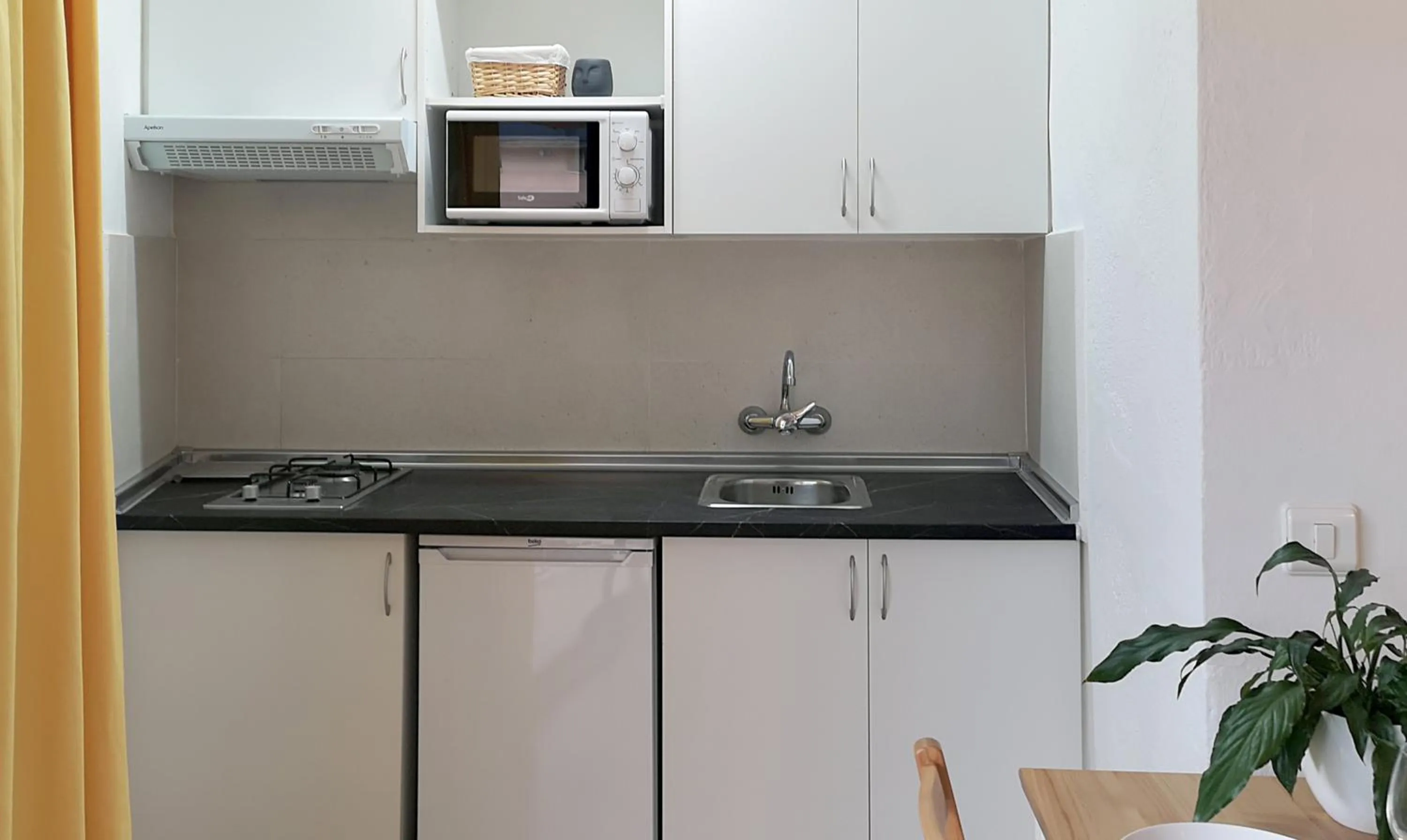 Kitchen or kitchenette in Apartamentos El Sol II