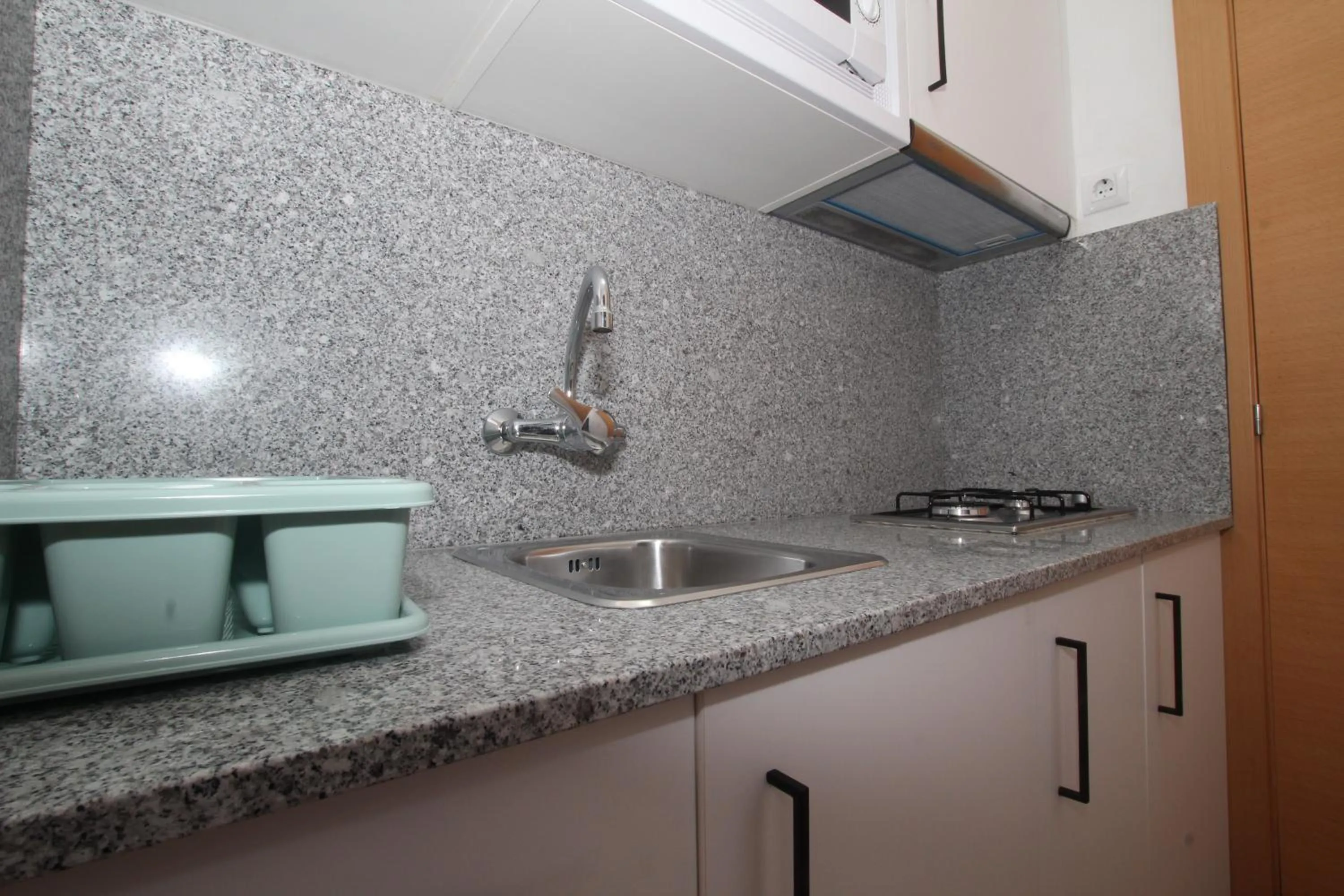 Kitchen or kitchenette in Apartamentos El Sol II