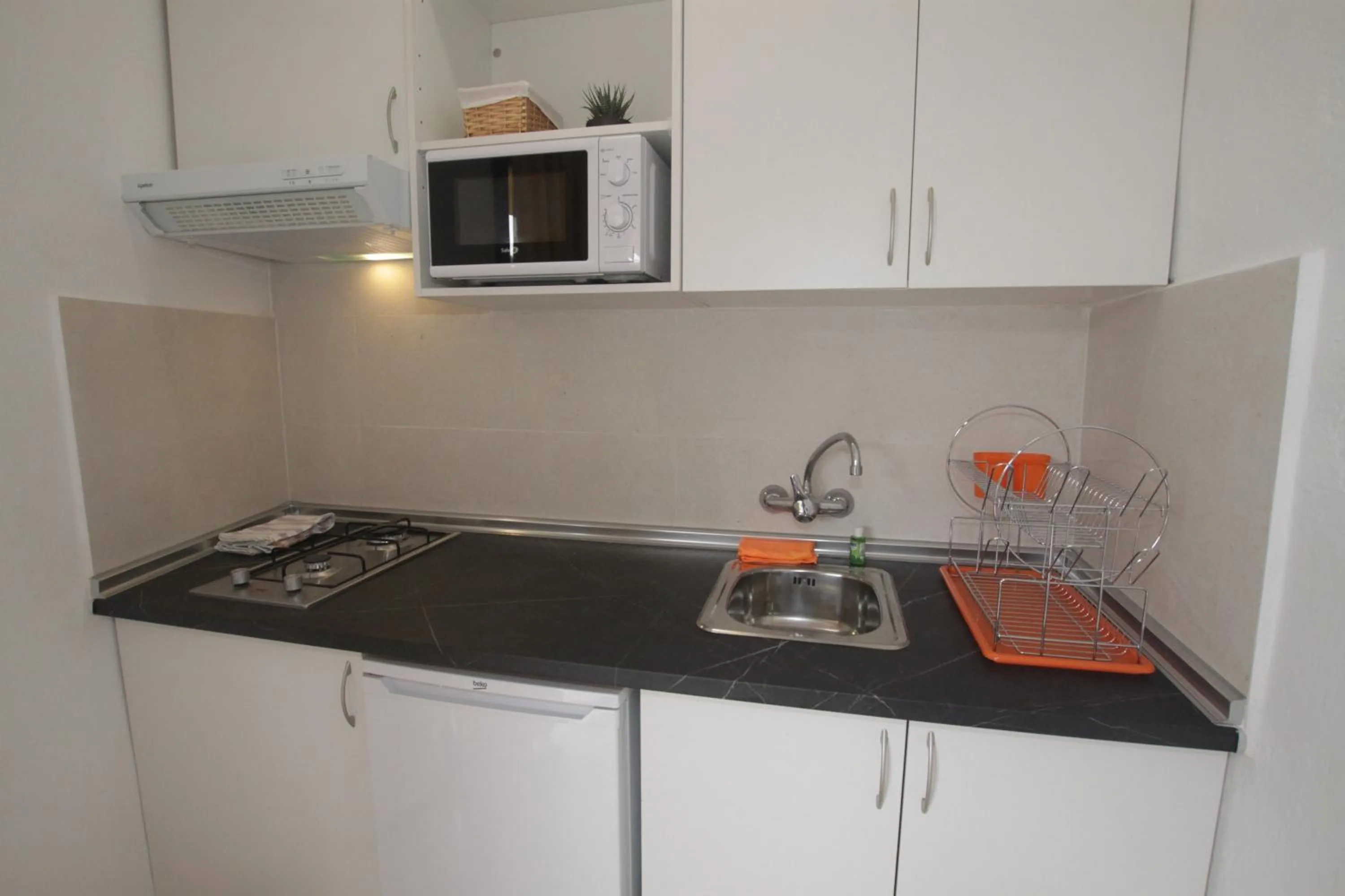 Kitchen or kitchenette in Apartamentos El Sol II