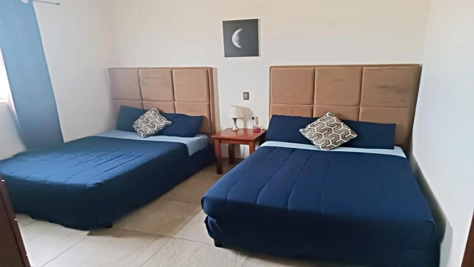 Photo of the whole room, Bed in Moon House F4: Spacious 3-Bedroom Apartment in Downtown