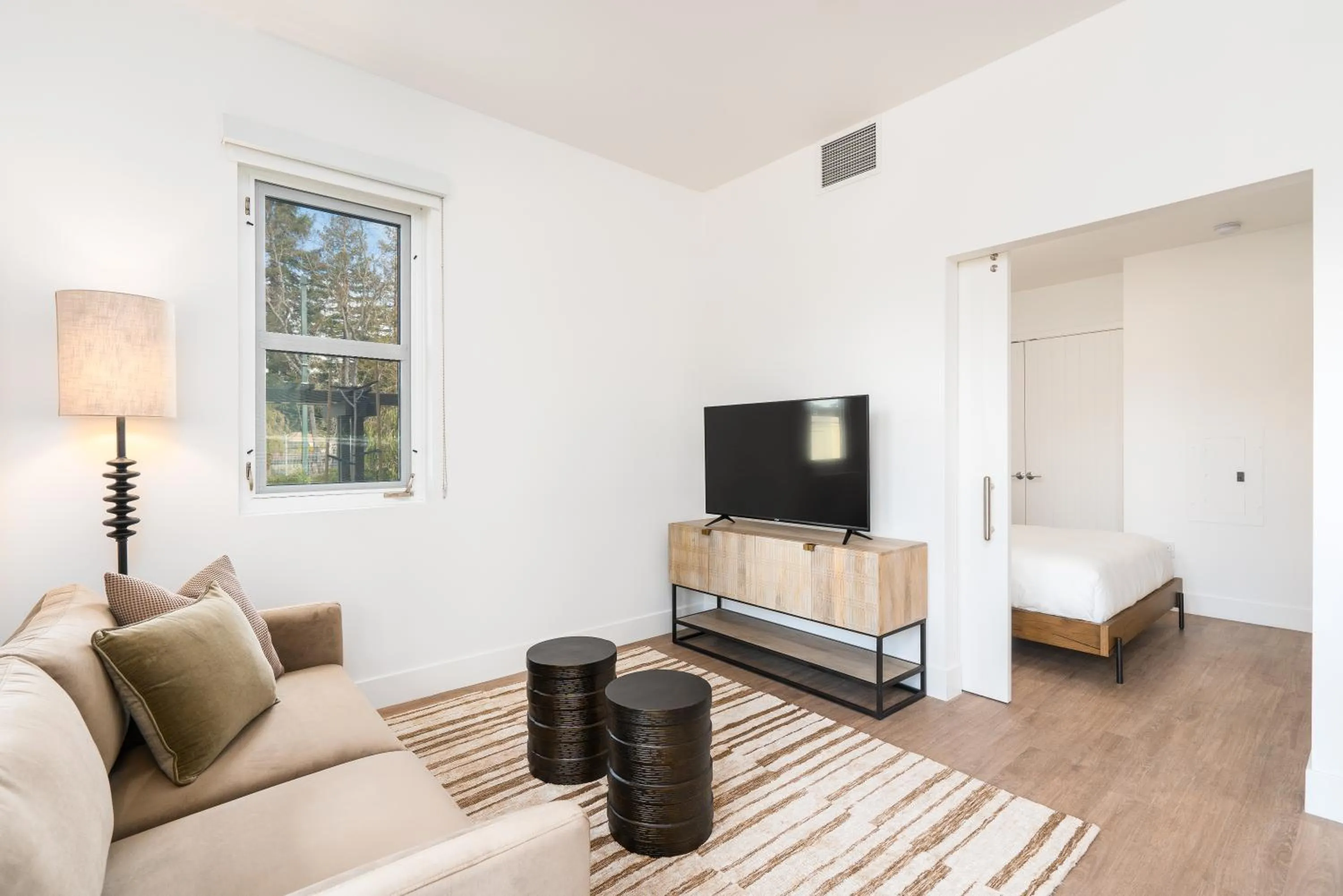 Living room in Mint House Menlo Park by Kasa