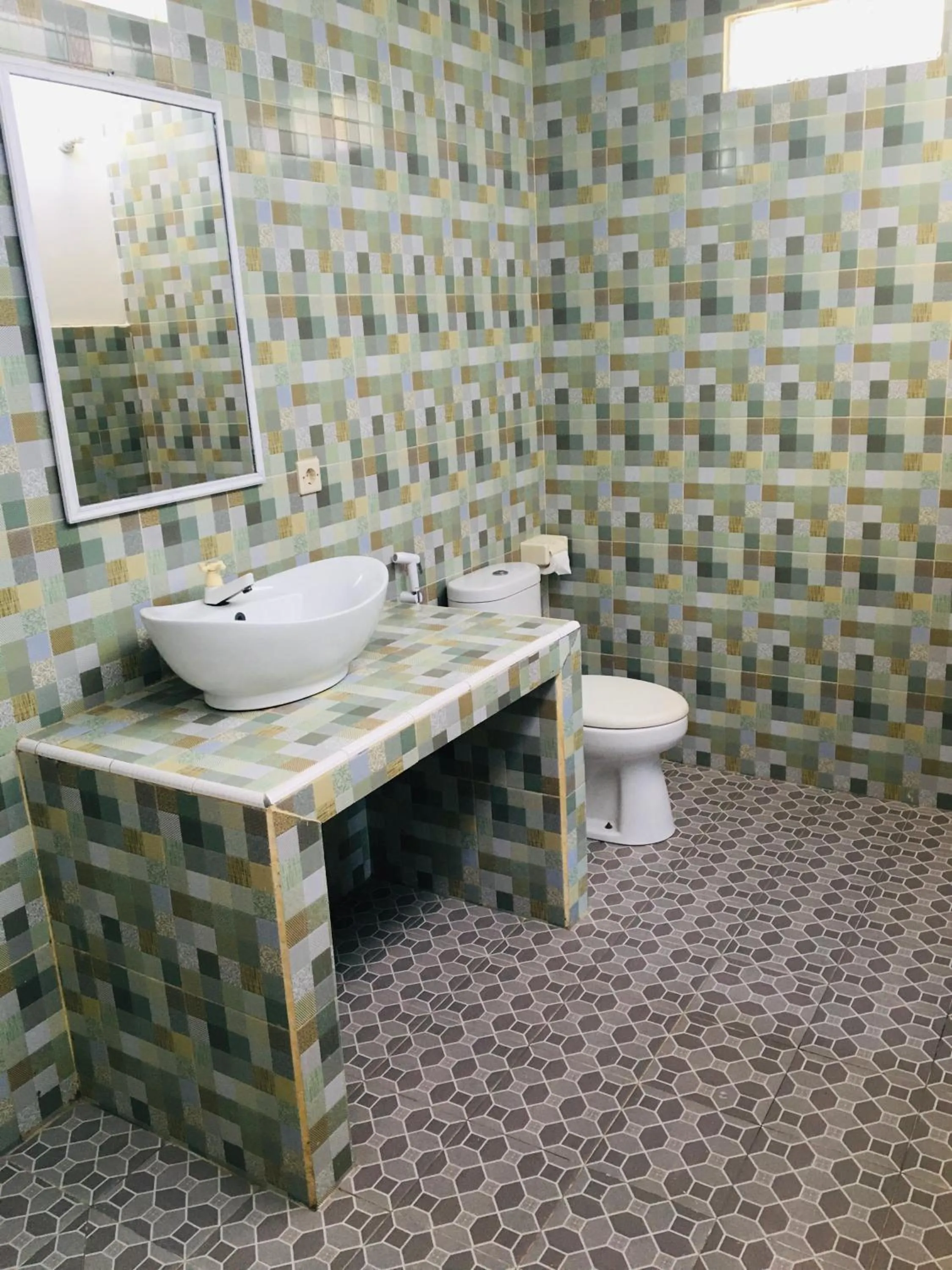 Toilet in Puring Bungalows