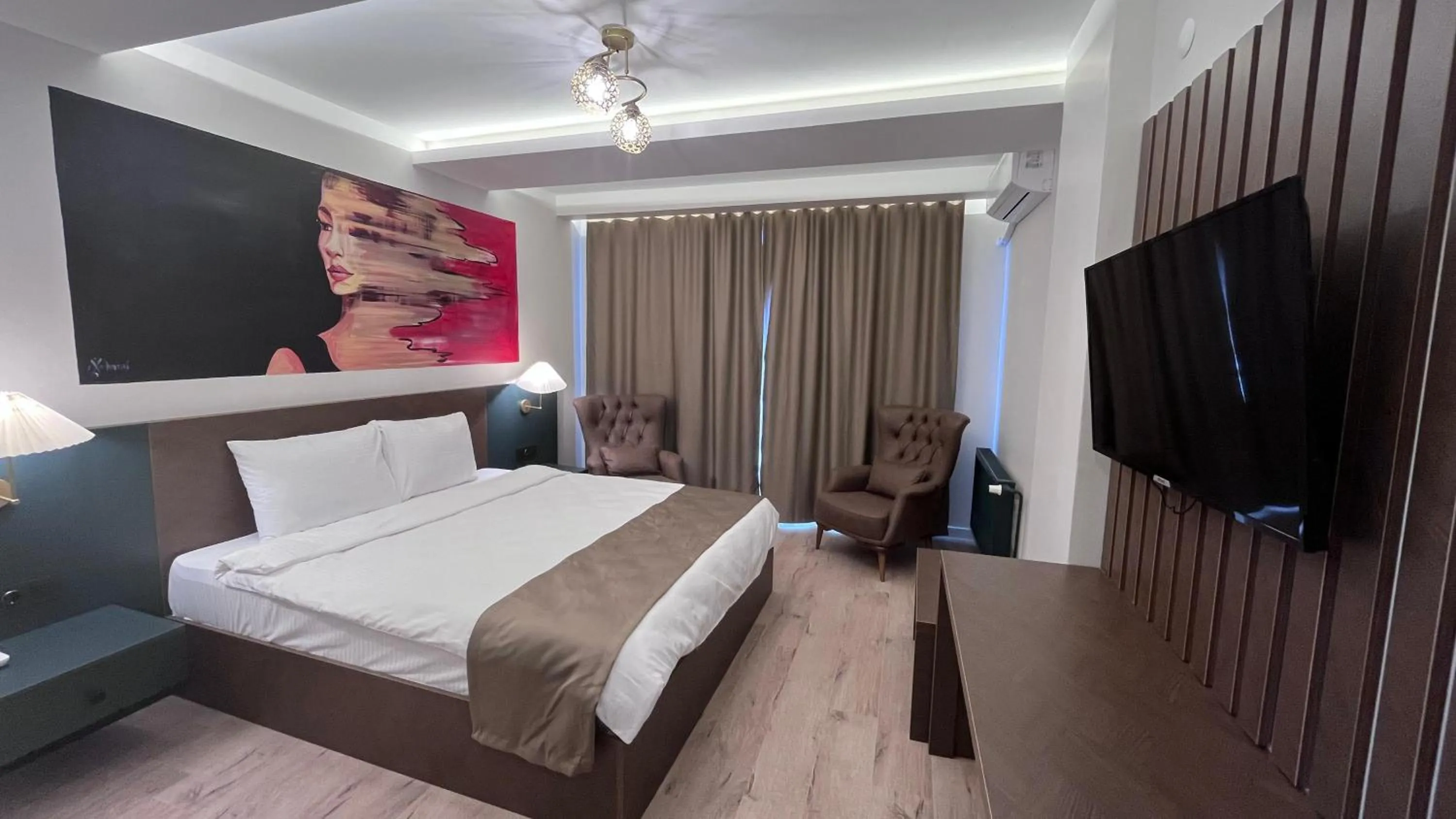 Communal lounge/ TV room, Bed in SAR-PER Hotel